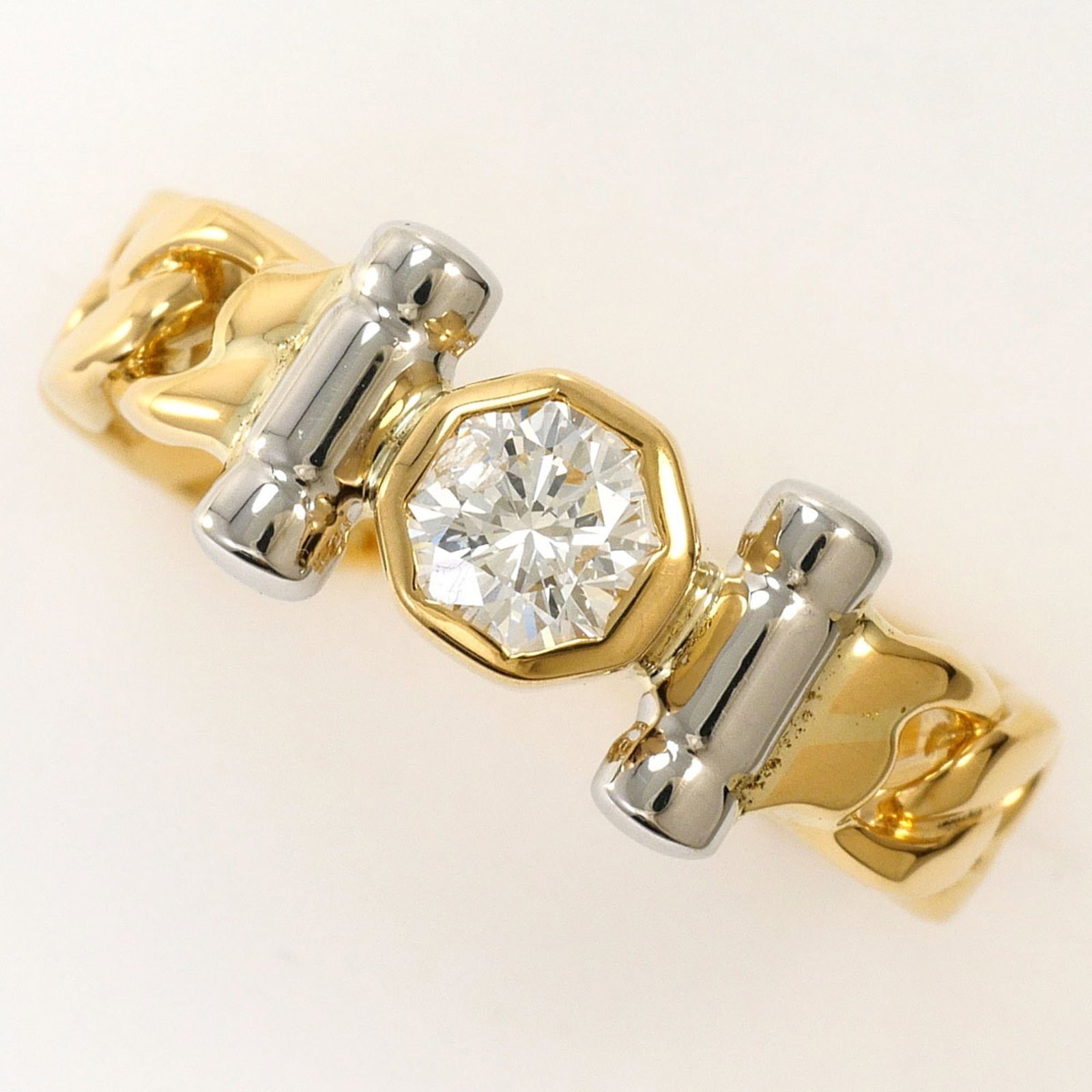 Unbranded Band Ring Platinum 900 Yellow Gold (18K): Unbranded Band Ring Platinum 900 Yellow Gold (18K) Platinum 900 Yellow Gold (18K) band ring with a diamond weighing 0.313 carats, set in a sturdy design that measures 7mm in width and features an US s