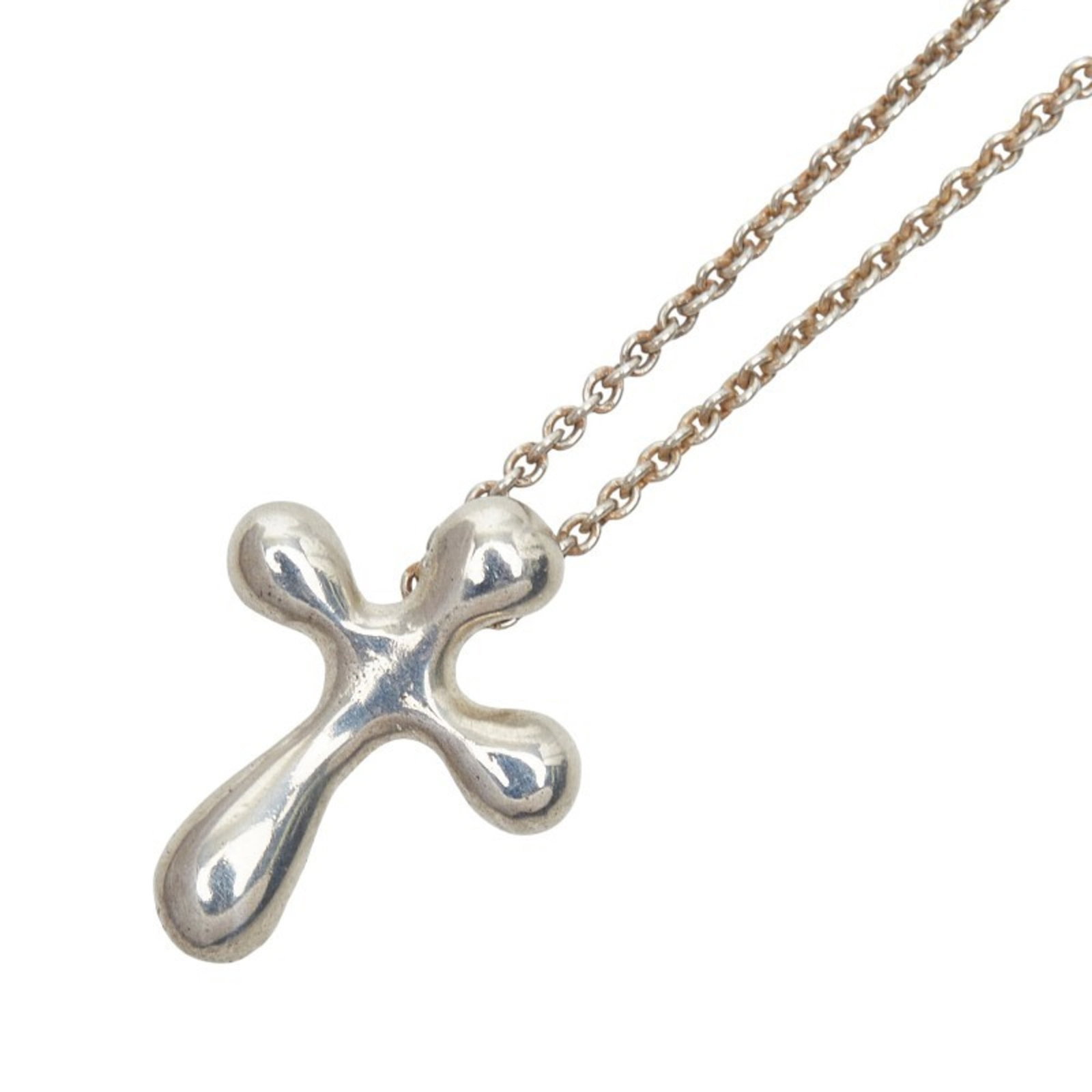 Tiffany & Co. Small Cross Necklace In 925 Sterling Silver For Women: Tiffany & Co. Small Cross Necklace In 925 Sterling Silver For Women Small Tiffany & Co. cross necklace in sterling silver, featuring a pendant size of 14.7mm x 11.5mm and a neck circumference of 42.3 