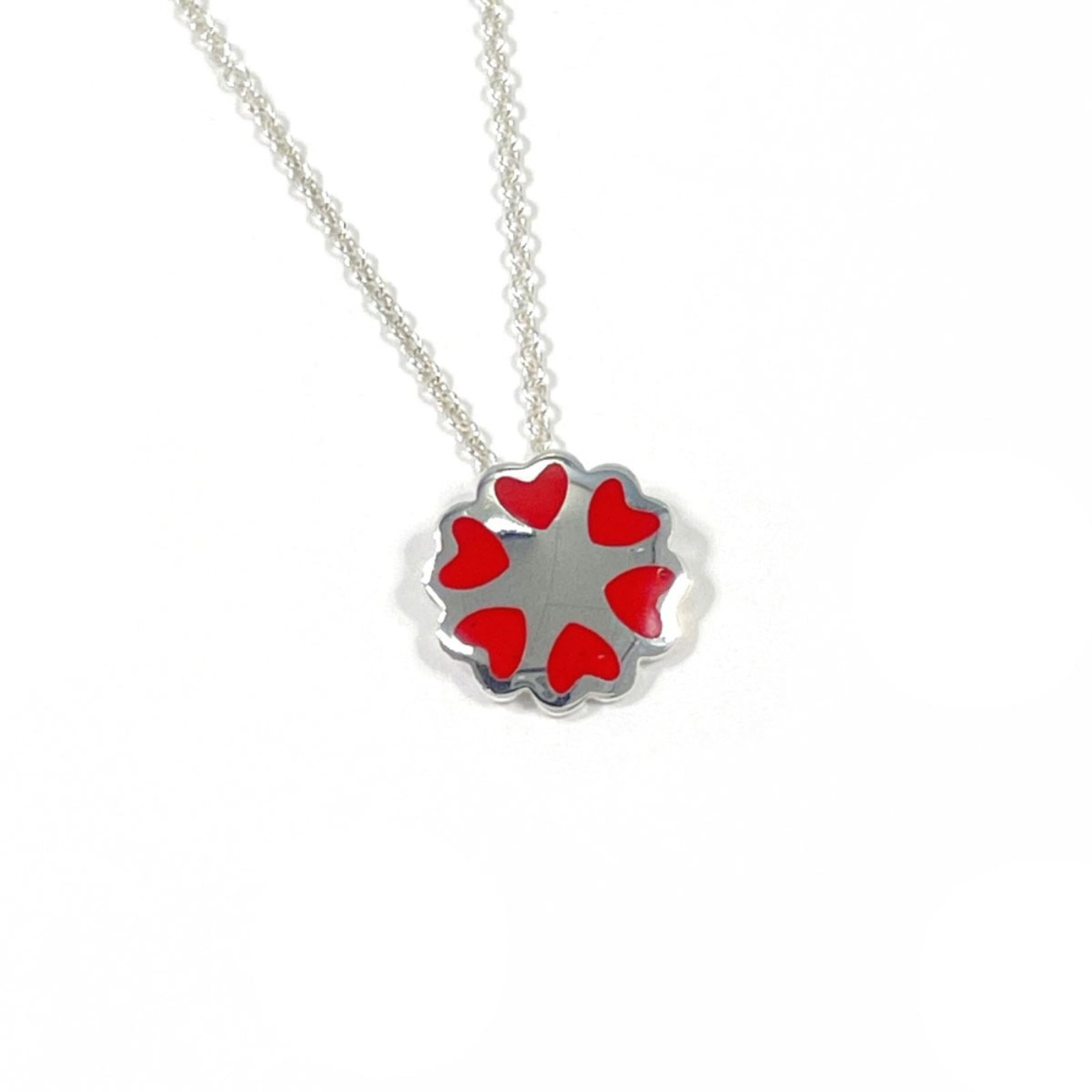 Women's Sterling Silver Paloma Picasso Necklace of Hearts Crown by Tiffany & Co.: Women's Sterling Silver Paloma Picasso Necklace of Hearts Crown by Tiffany & Co. Sterling silver necklace featuring the Paloma Picasso design, with a red color and heart-shaped crown pendant. The neck