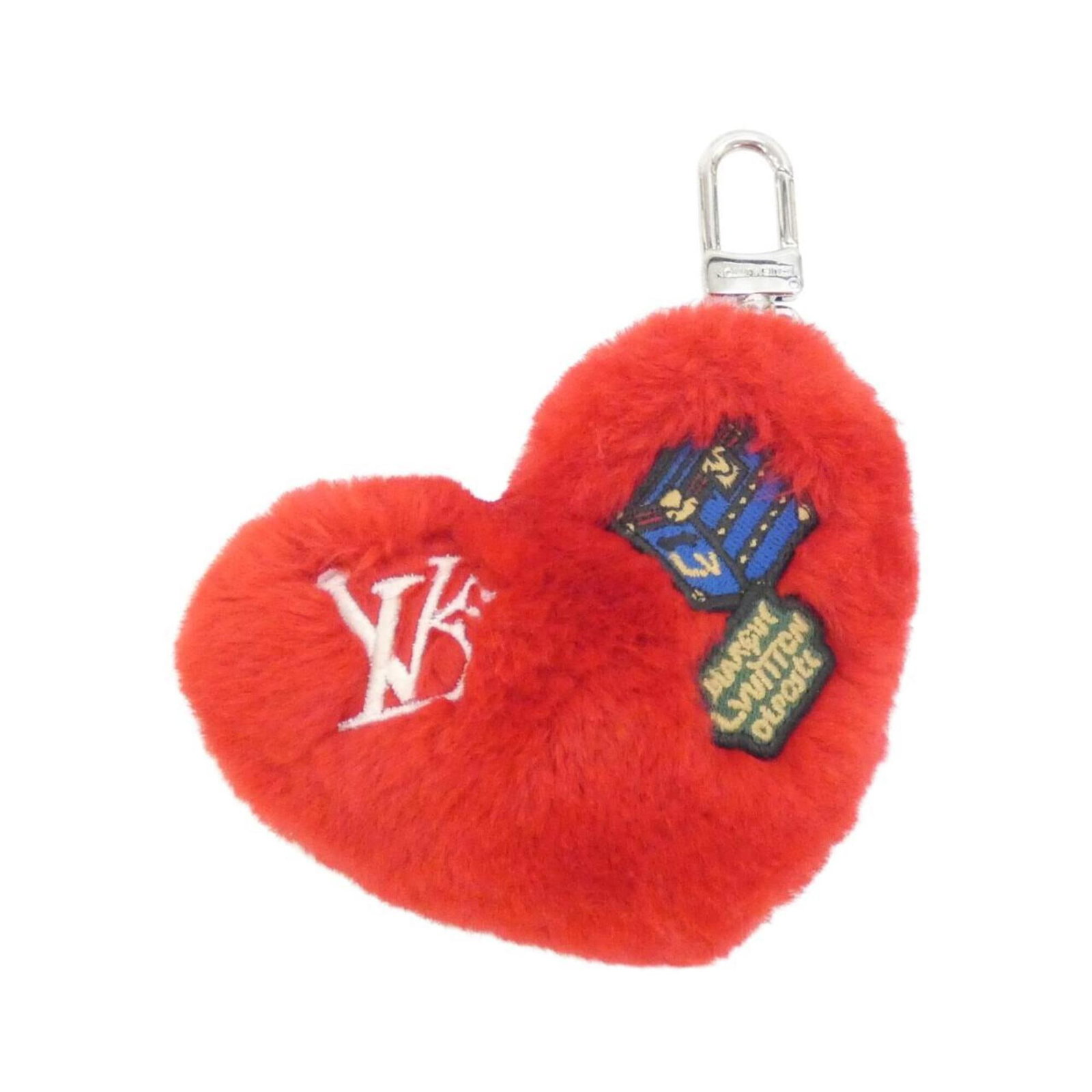 Louis Vuitton Handbag Charm Velvet: Louis Vuitton Handbag Charm Velvet Red velvet Louis Vuitton handbag charm. Made from luxurious velvet, this charming accessory features the iconic Louis Vuitton brand. A stylish addition to any