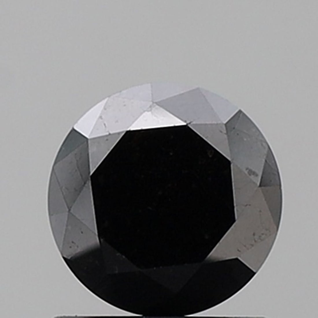 Round 1.24ct Black VVS2 - Loose Natural Diamond: Round 1.24ct Black VVS2 - Loose Natural Diamond 1.24ct Round Black Diamond with Exceptional Clarity and Polish, Measuring 6.37L x 6.33W x 4.51H. This Natural Fancy Diamond boasts an EX Cut, VVS2 Clari