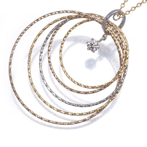 Diamond 0.10Ct 3Color Twist Hoop Circle Solitaire Necklace 18K Yg/ Wg/ Rg: Diamond 0.10Ct 3Color Twist Hoop Circle Solitaire Necklace 18K Yg/ Wg/ Rg Multi-toned gold metal pendant features a natural diamond solitaire, set in an elegant twist hoop circle design. The 0.10ct di