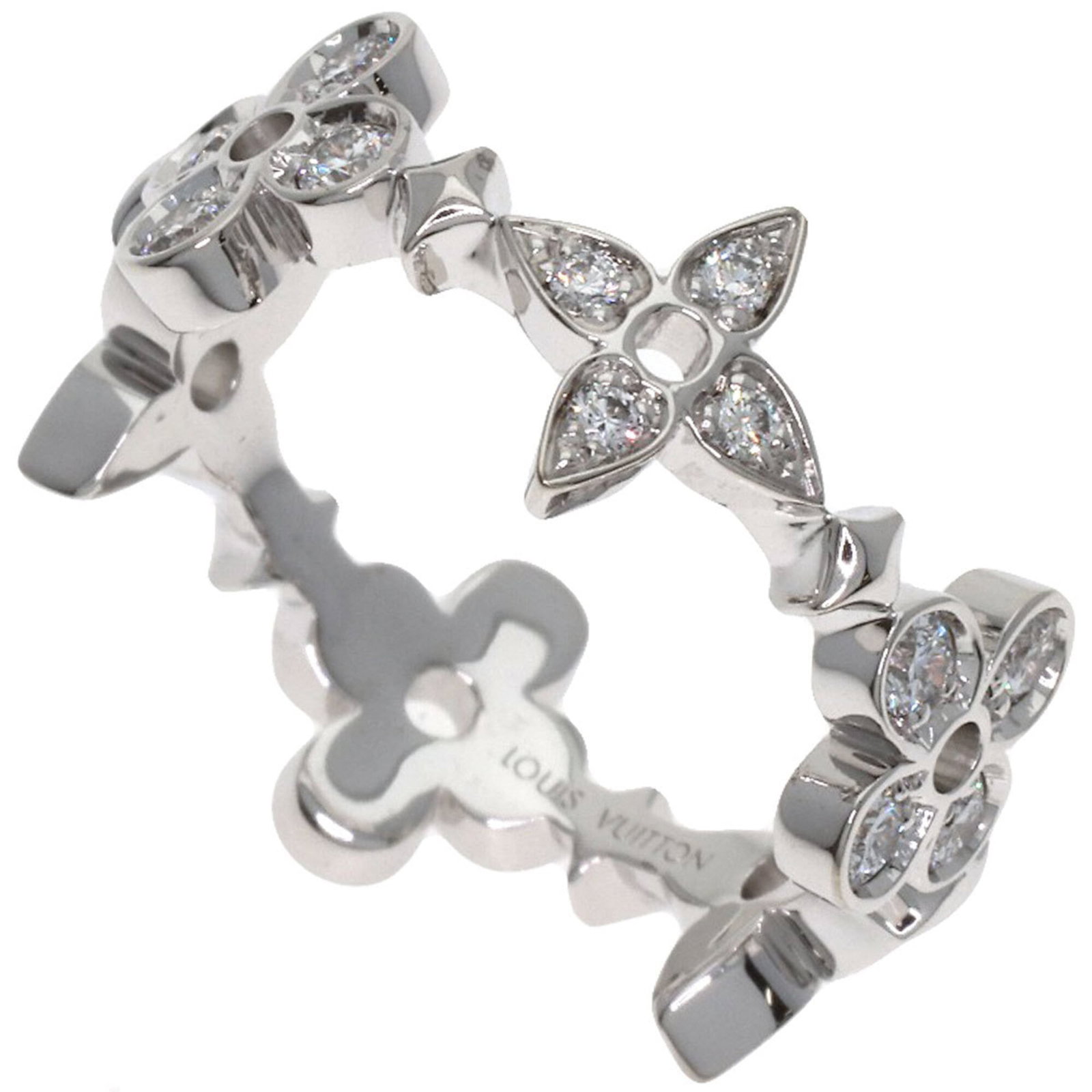 White Gold Band Ring Louis Vuitton: White Gold Band Ring Louis Vuitton White gold (18K) band ring from Louis Vuitton, featuring a diamond stone and US size 5.5. This elegant ring showcases the iconic brand's signature style with its