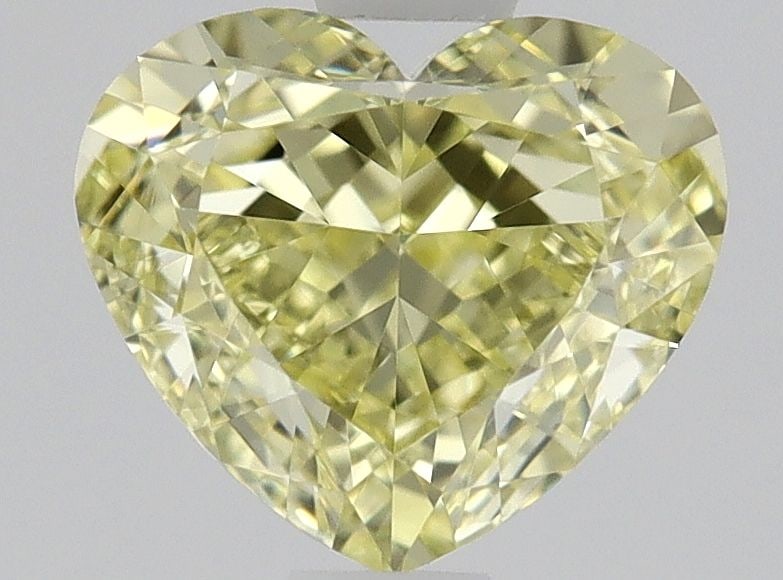 GIA Heart 0.9ct Fancy Yellow IF - Loose Natural Diamond: GIA Heart 0.9ct Fancy Yellow IF - Loose Natural Diamond GIA certifies this Fancy Yellow diamond as IF, indicating its exceptional clarity. Measuring 5.28 x 6.07 x 3.54mm, it boasts a vibrant Fancy