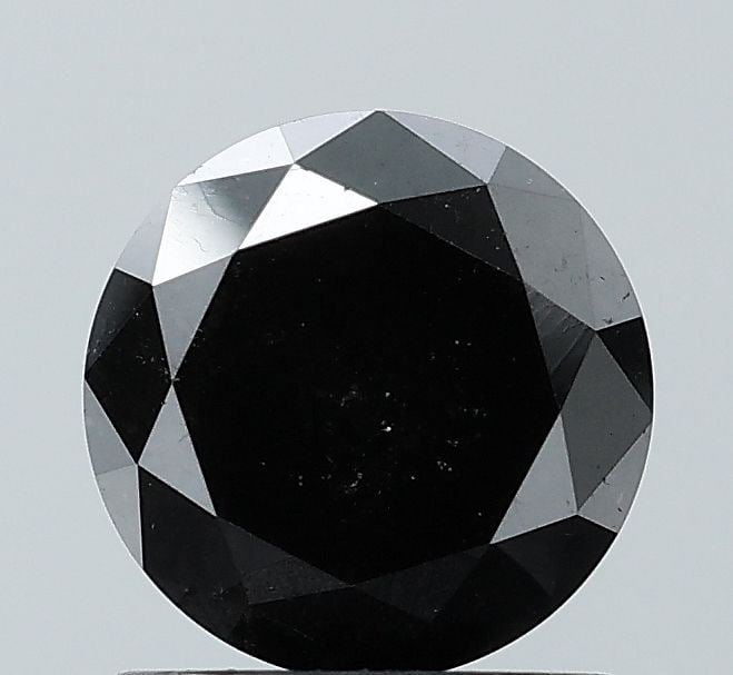 Round 1.37ct Black VVS2 - Loose Natural Diamond: Round 1.37ct Black VVS2 - Loose Natural Diamond 1.37ct Round Black Diamond with Exceptional Clarity and Polish, Measuring 6.64L X 6.62W X 4.62H. This natural Fancy diamond boasts an EX symmetry and VV