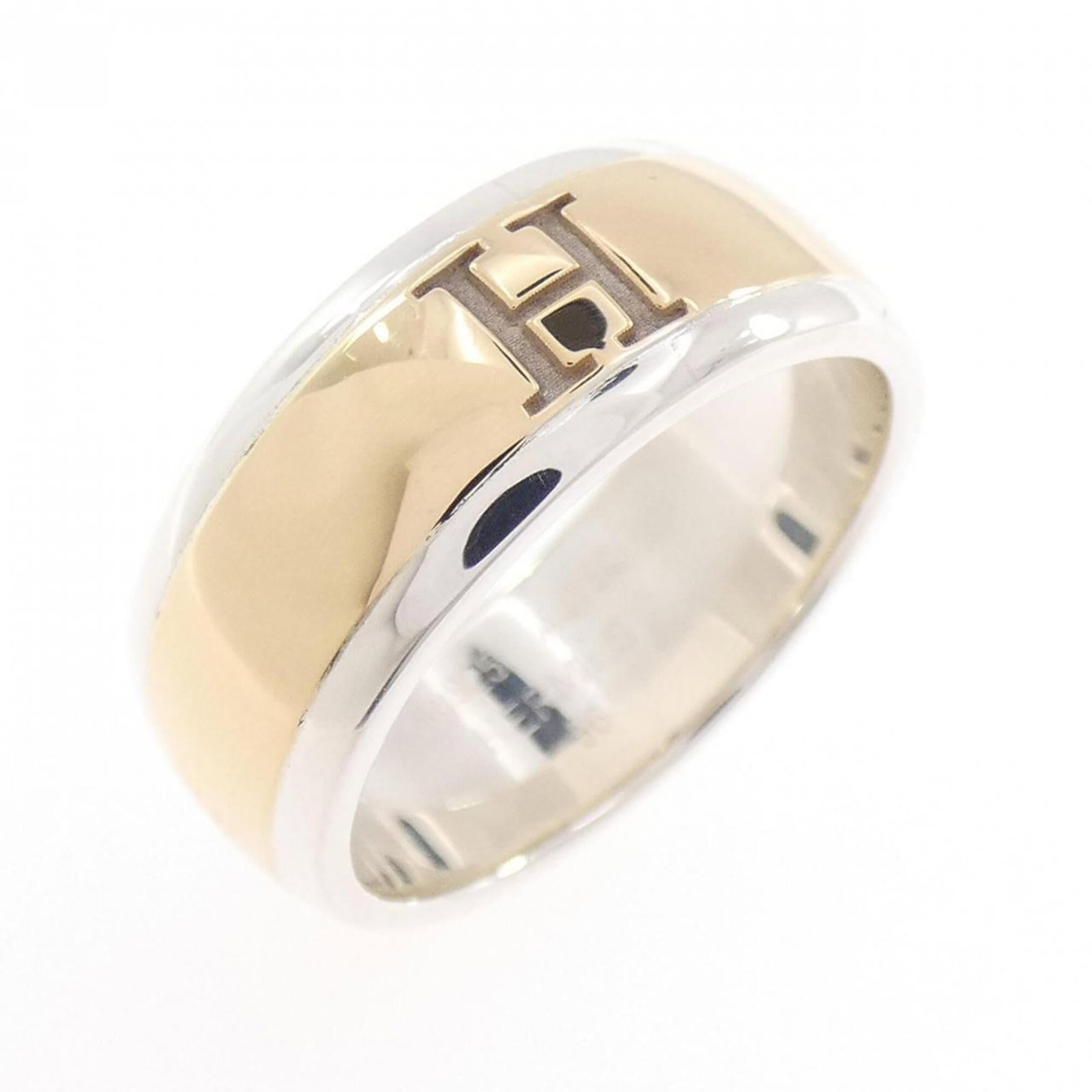 Silver yellow 925 gold ring band Hermes 18K: Silver yellow 925 gold ring band Hermes 18K Silver yellow 925 gold ring band from Hermes, featuring 18K yellow gold and a silver 925 band. This women's band measures 56 US size 8. The signature bears 