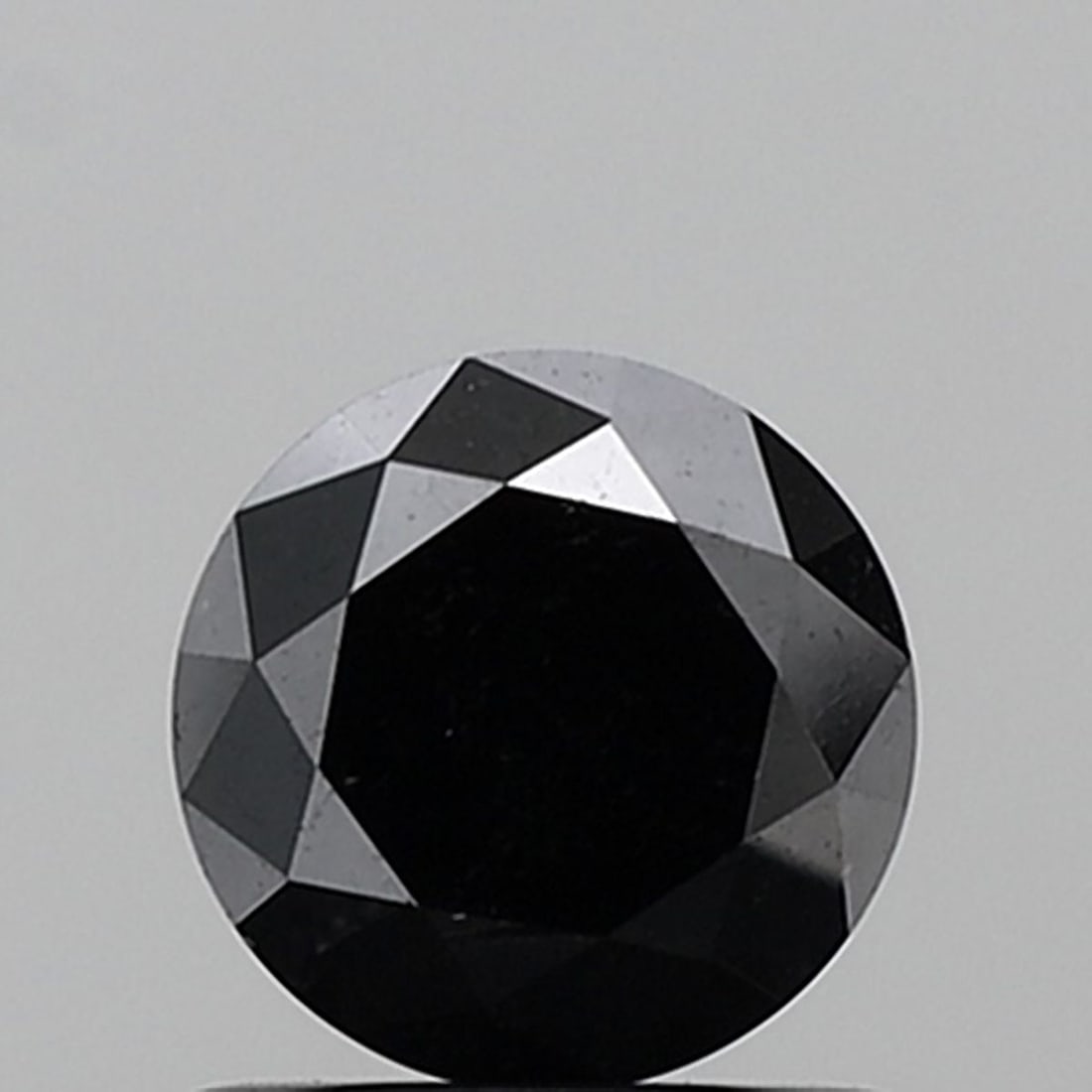 Round 1.11ct Fancy Black VVS2 - Loose Natural Diamond: Round 1.11ct Fancy Black VVS2 - Loose Natural Diamond Round 1.11ct Fancy Black VVS2 - Loose Natural Diamond, showcasing exceptional clarity and color with EX polish and symmetry. This stunning