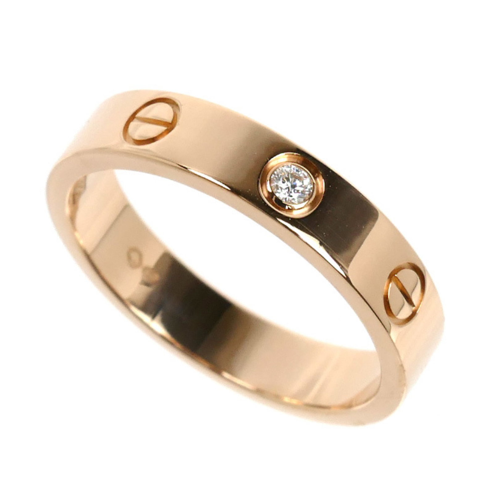 Pink Gold Cartier Ring Band: Pink Gold Cartier Ring Band Pink Gold Cartier Ring Band - A stunning piece from the renowned French luxury brand, featuring 18K pink gold and a diamond stone. This elegant band boasts a classic design