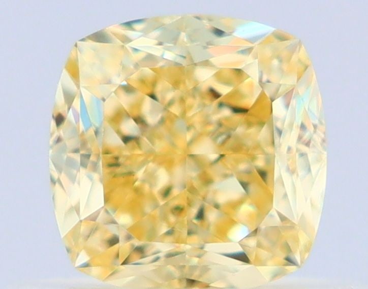 GIA Cushion Brilliant 0.56ct Fancy Yellow VVS2 - Loose Natural Diamond: GIA Cushion Brilliant 0.56ct Fancy Yellow VVS2 - Loose Natural Diamond GIA certified, this 0.56ct Fancy Yellow diamond boasts exceptional clarity with a VVS2 grade and vibrant color, showcasing its na