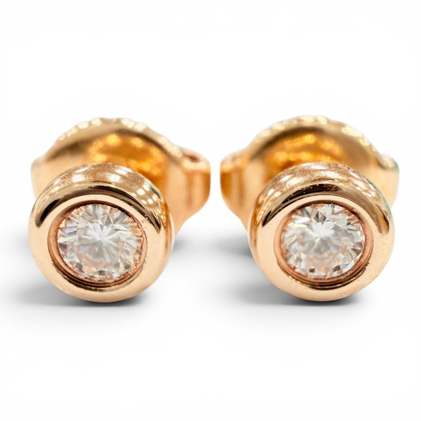 Pink Gold 18K Stud Earrings Tiffany: Pink Gold 18K Stud Earrings Tiffany Pink gold (18K) stud earrings from Tiffany, featuring diamonds and made in Spain. These elegant earrings showcase the luxury of pink gold and the sparkle of