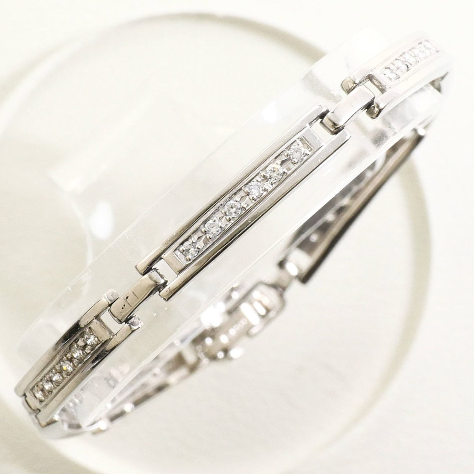 Platinum Charm Bracelet 850: Platinum Charm Bracelet 850 The Platinum Charm Bracelet 850 boasts a stunning platinum finish and features a beautiful diamond stone, adding a touch of luxury to its sleek design. With a length of