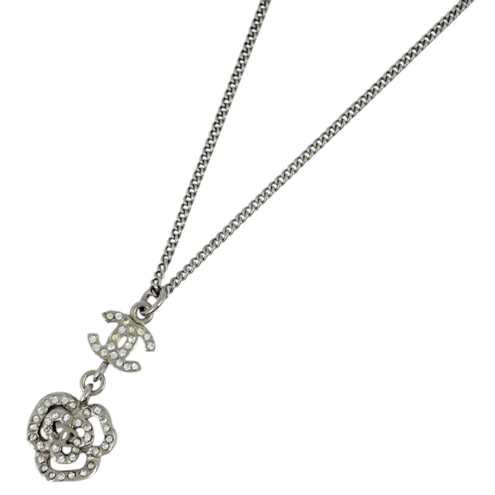 Silver Rhinestone Mark Coco Chanel Women's Necklace Plated: Silver Rhinestone Mark Coco Chanel Women's Necklace Plated Silver Rhinestone Mark Coco Chanel Women's Necklace Plated. This stunning necklace features a large silver rhinestone pendant, measuring