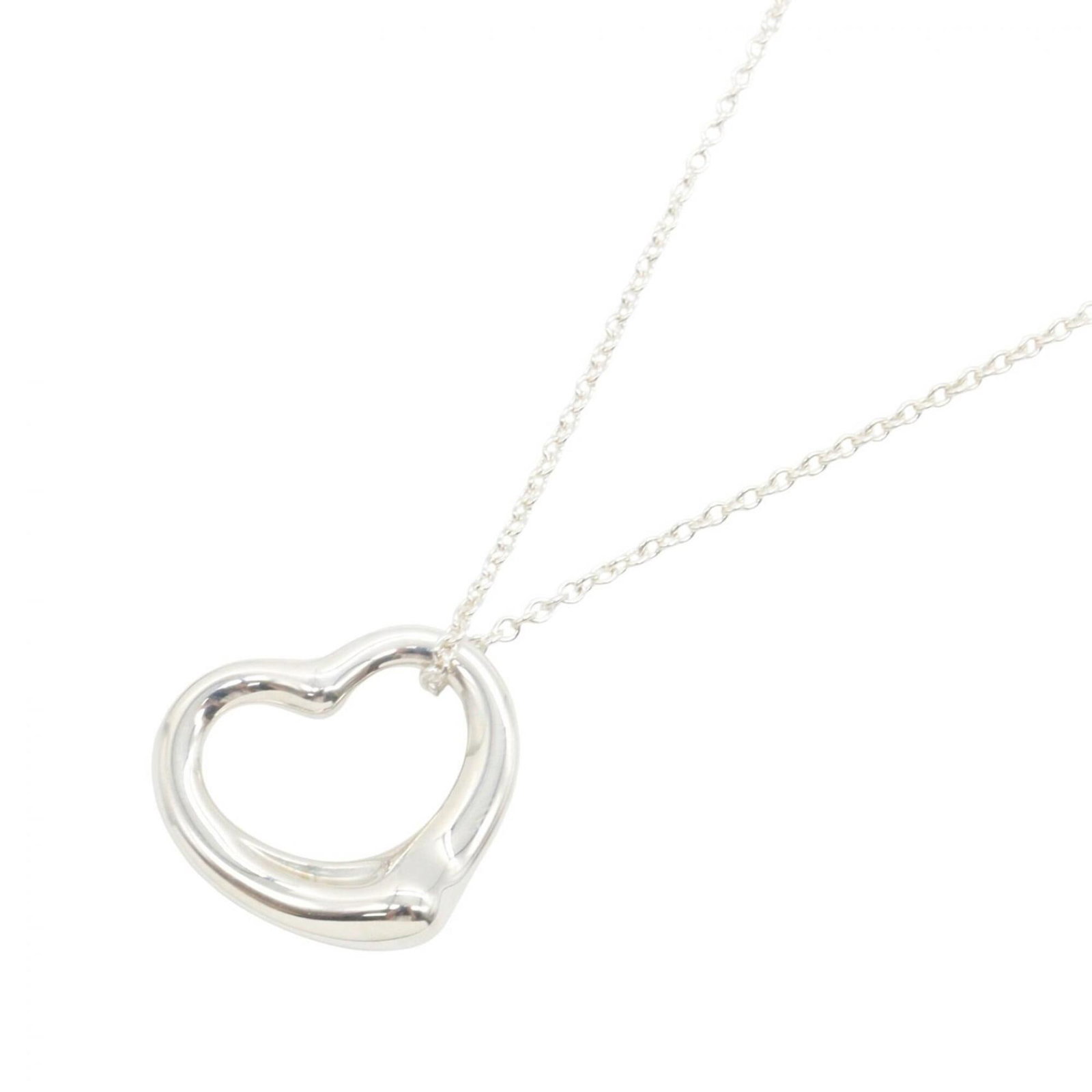 Tiffany & Co. Open Heart Necklace Sterling Silver 925 Women'S Jewelry Tone: Tiffany & Co. Open Heart Necklace Sterling Silver 925 Women'S Jewelry Tone Tiffany & Co. Open Heart Necklace in sterling silver 925 features a classic design with a 20mm x 22mm pendant, suspended from
