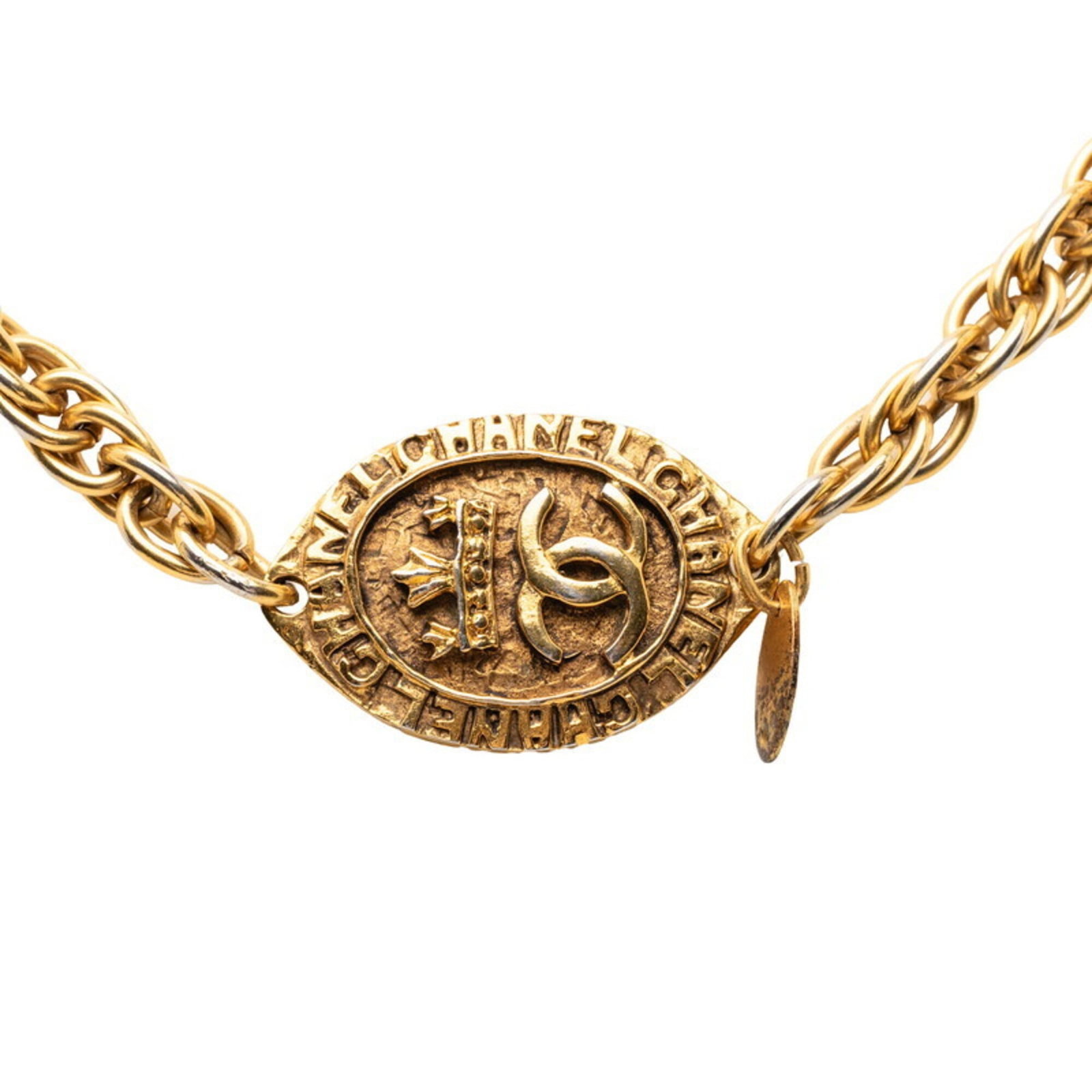Long Gold Plated Chanel Women's Necklace: Long Gold Plated Chanel Women's Necklace Long Gold Plated Chanel Women's Necklace boasts a striking gold plating finish and elegant design, measuring 22.5mm x 34.4mm. The necklace features a gold