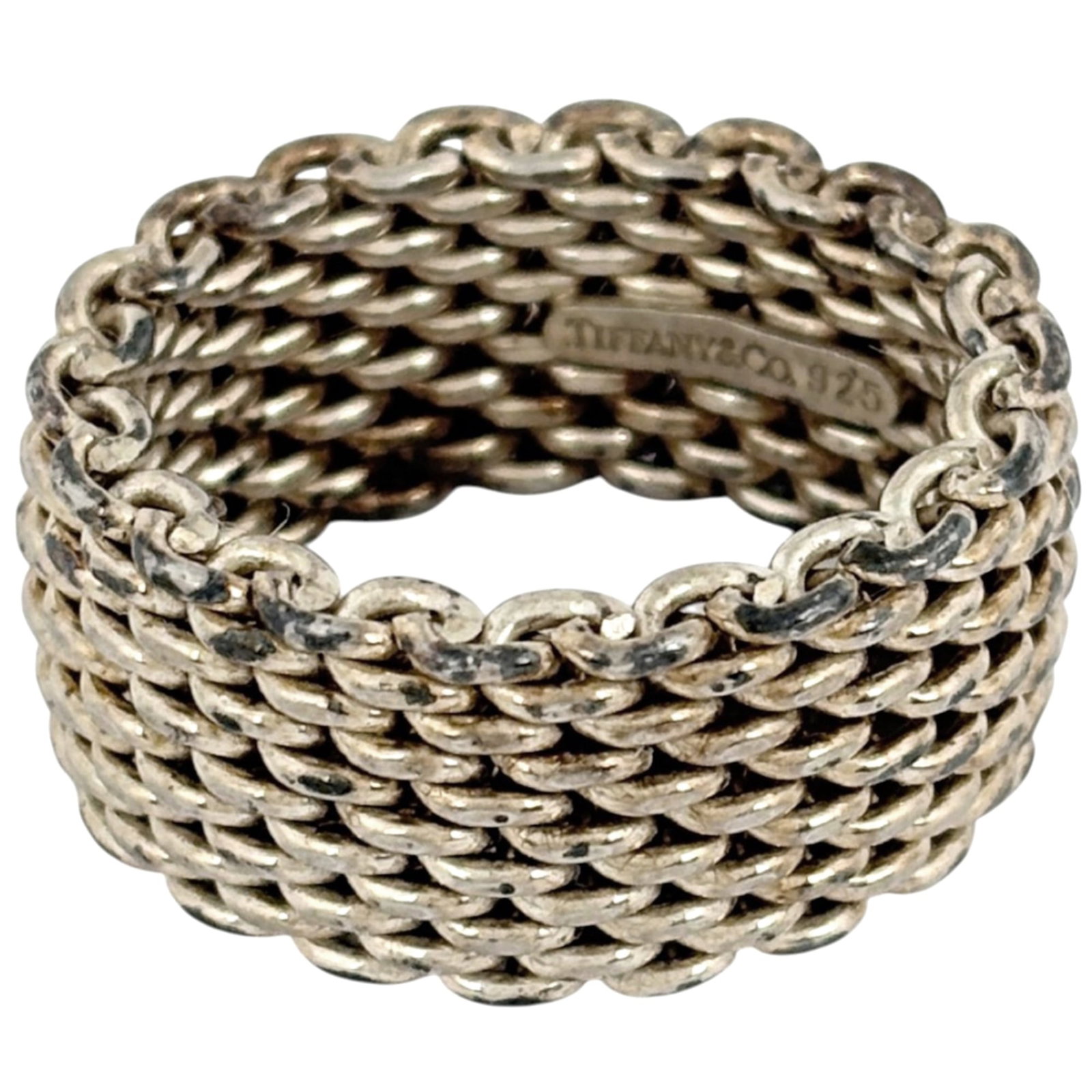 Silver Ring Band Tiffany: Silver Ring Band Tiffany Silver Ring Band Tiffany is made from high-quality silver (925 US) and features a classic design. This elegant band ring is available in size 5.5, perfect for those looking to