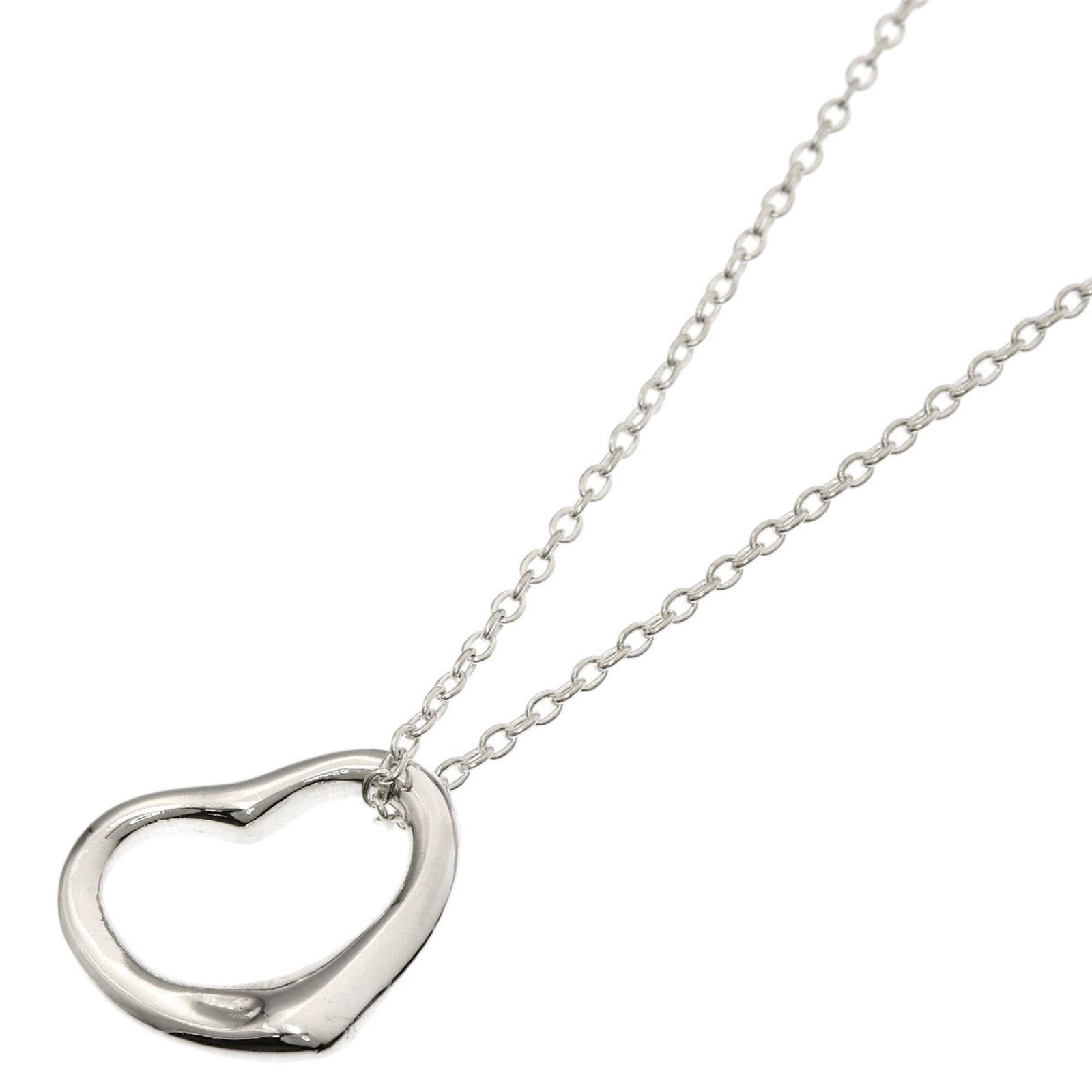 Tiffany & Co. Open Heart Necklace Silver Women'S.: Tiffany & Co. Open Heart Necklace Silver Women'S. Tiffany & Co. Open Heart Necklace in Silver - A stunning silver necklace featuring an open heart pendant, measuring 13.6mm x 14mm, suspended from a ch