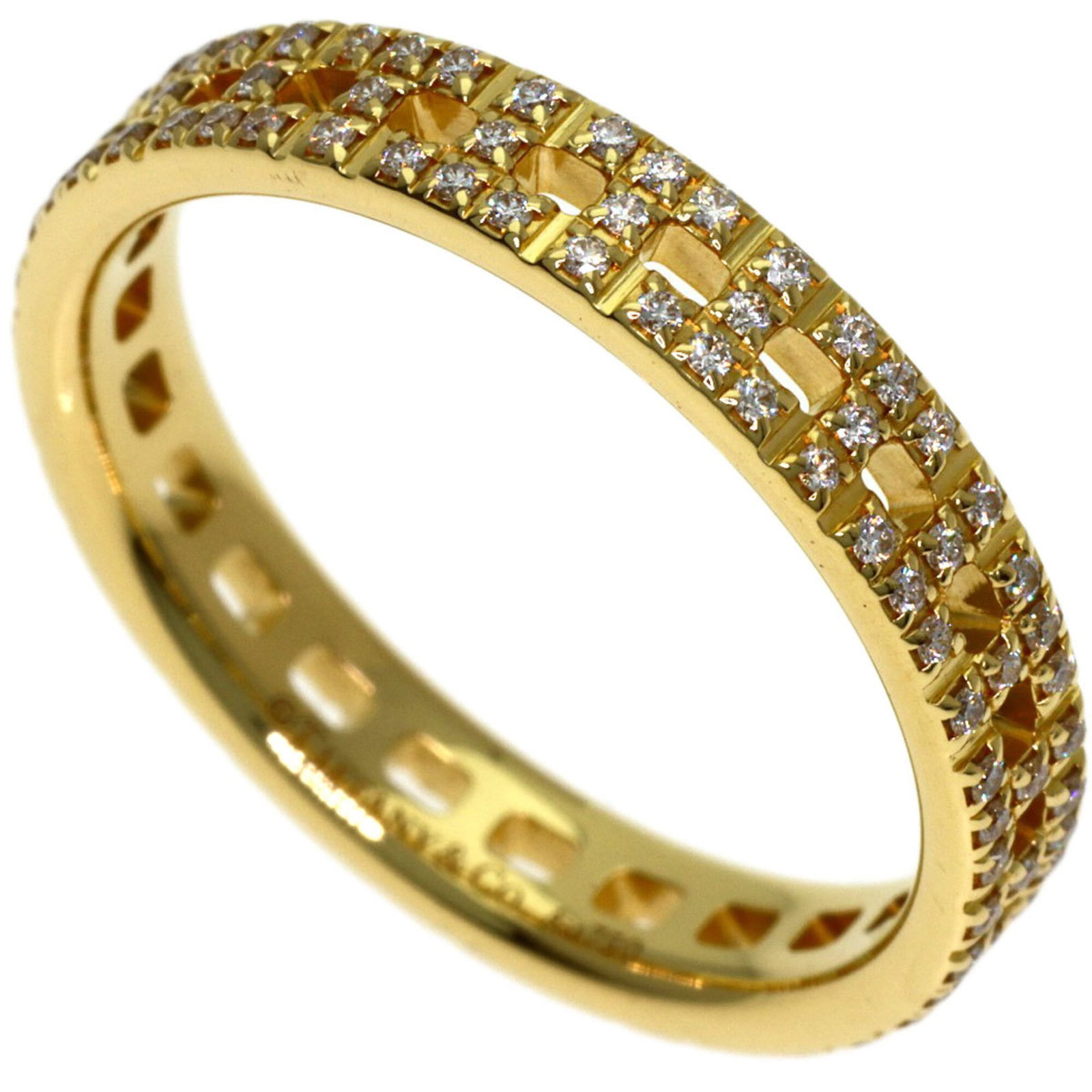 Tiffany ring gold 18k yellow band: Tiffany ring gold 18k yellow band 18k yellow gold band with a diamond stone, available in US size 6.5. This Tiffany ring features a classic design with a durable and luxurious yellow gold construction