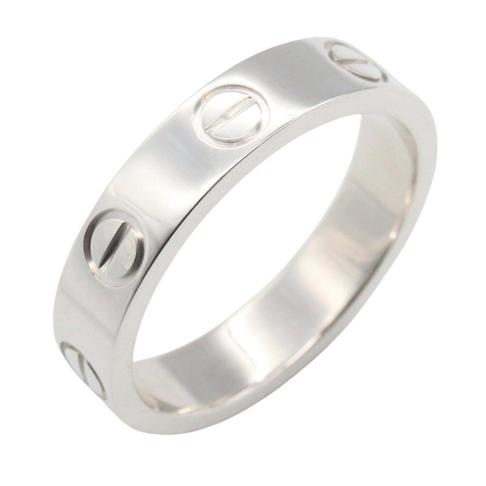 White Gold Band Ring by Cartier 18K: White Gold Band Ring by Cartier 18K Cartier's 18K white gold band ring boasts elegant simplicity, making it a timeless addition to any jewelry collection. Crafted from high-quality white gold, this ri