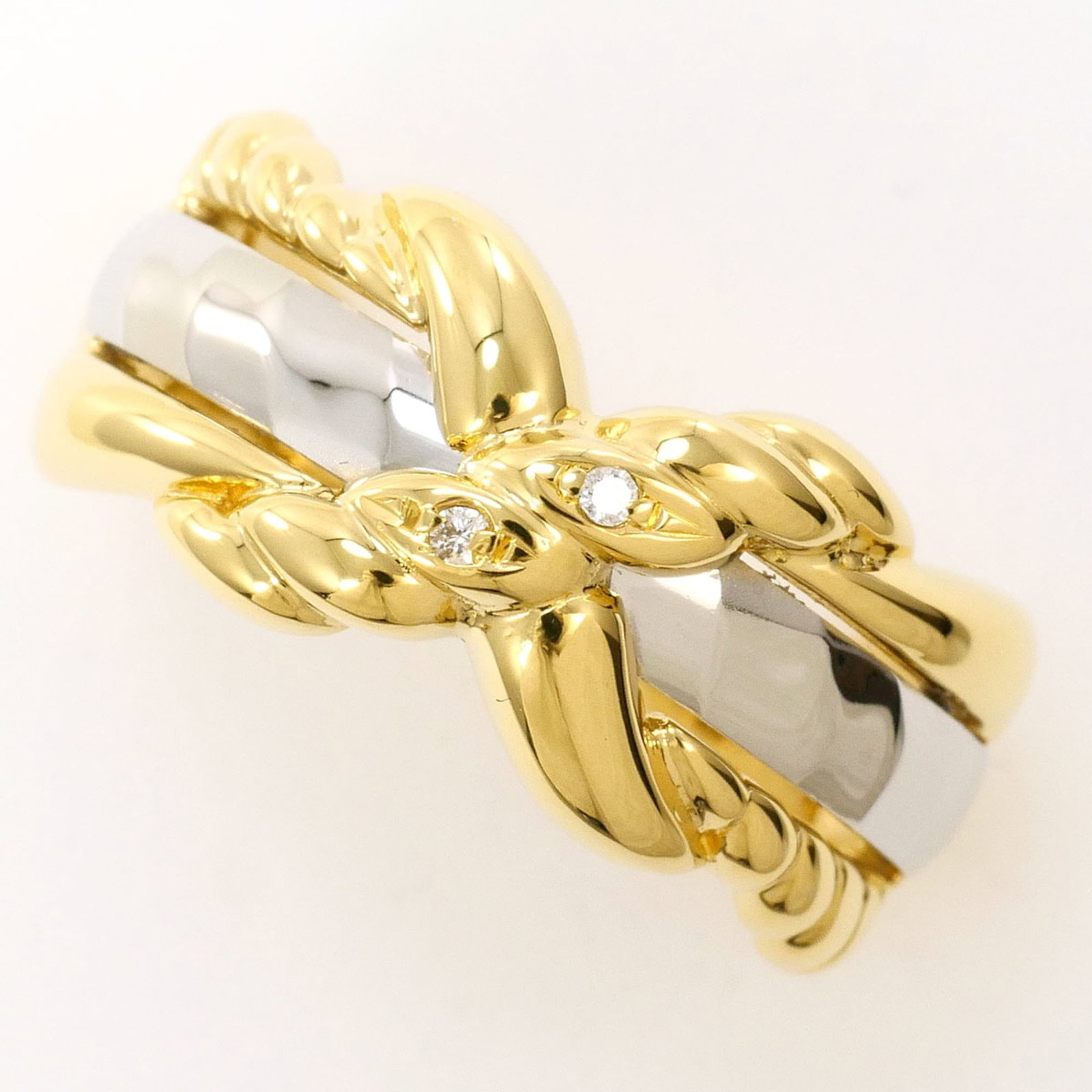 Unbranded Band Ring Platinum 900 Yellow Gold (18K): Unbranded Band Ring Platinum 900 Yellow Gold (18K) Platinum 900 Yellow Gold band ring with a diamond weighing 0.01 carats, set in 18K gold and featuring a width of 10mm. This elegant ring boasts a stu