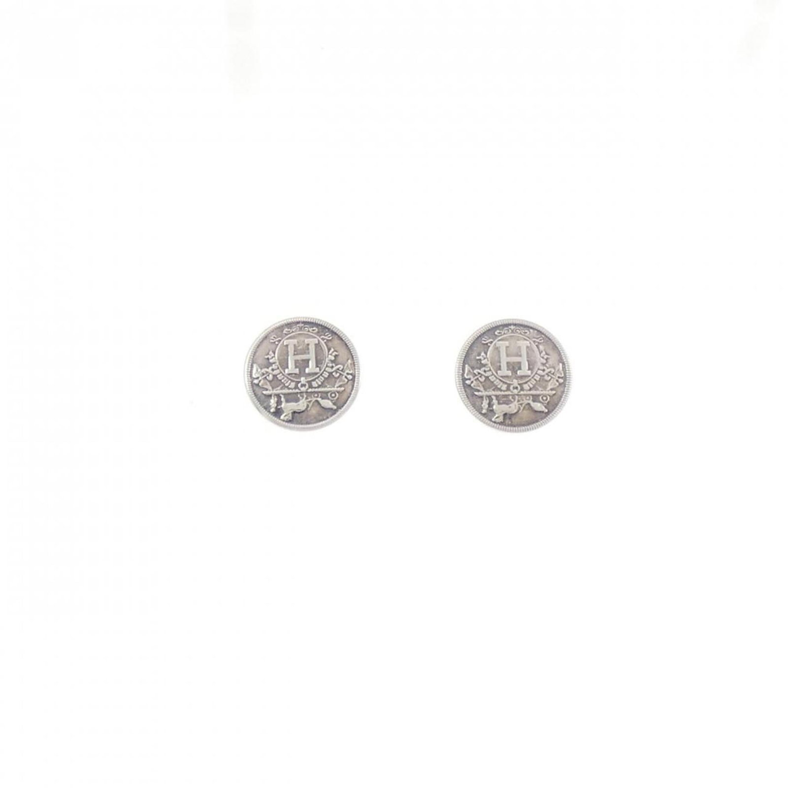 Hermes Stud Silver 925 Earrings: Hermes Stud Silver 925 Earrings Stud earrings in silver 925, bearing the iconic Hermes brand. Made from high-quality sterling silver, these elegant earrings are crafted with precision and attention to