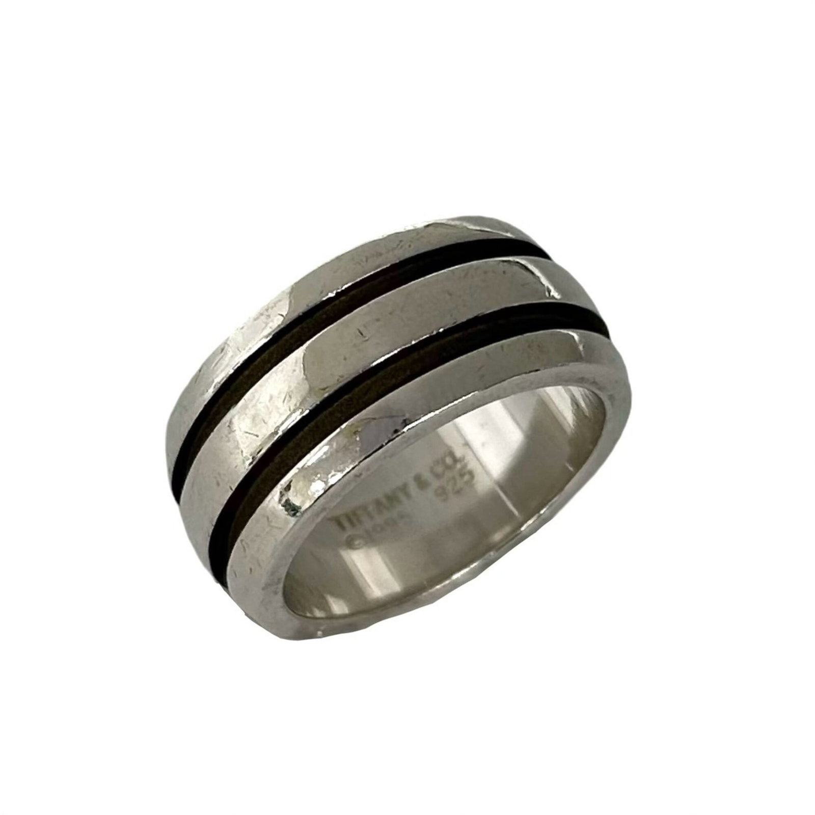 Silver Ring Band Tiffany: Silver Ring Band Tiffany Silver Ring Band Tiffany, US Size 6. A sterling silver band ring with a classic design from the iconic brand Tiffany. Made from high-quality silver material (925), this elegan