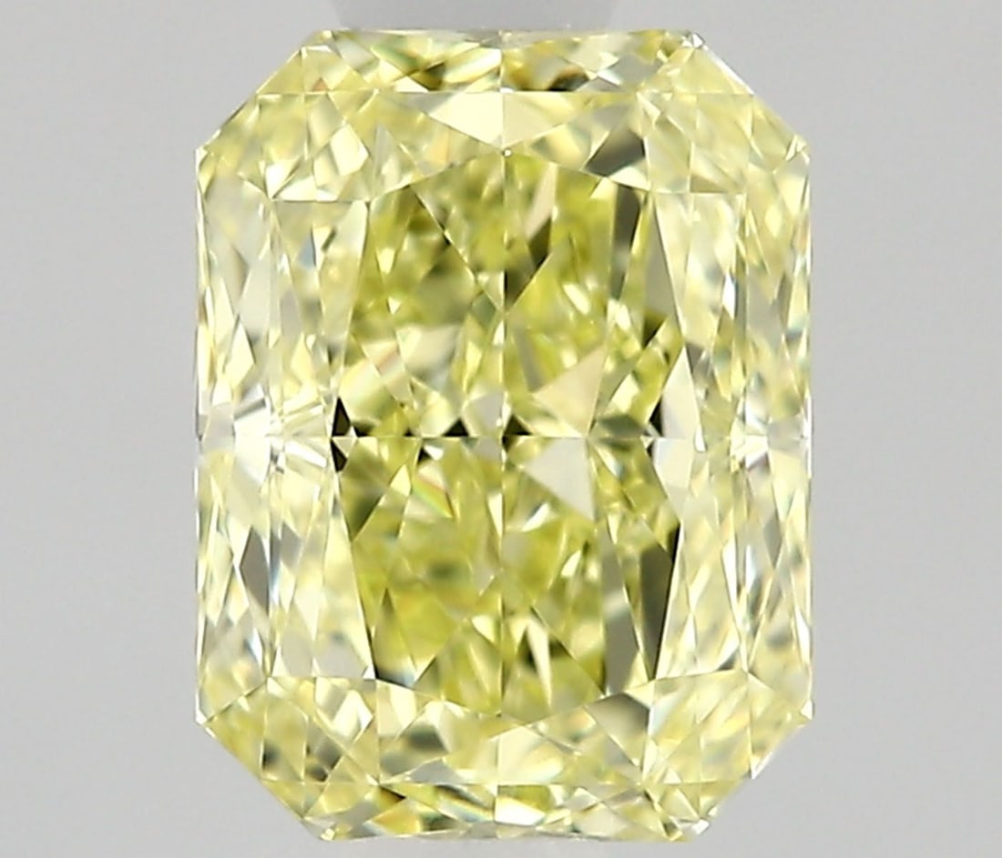 GIA Radiant 0.74ct Fancy Yellow VVS1 - Loose Natural Diamond: GIA Radiant 0.74ct Fancy Yellow VVS1 - Loose Natural Diamond GIA-certified, this stunning 0.74ct Fancy Yellow VVS1 diamond boasts exceptional clarity and color. Its EX polish and GD symmetry make it a