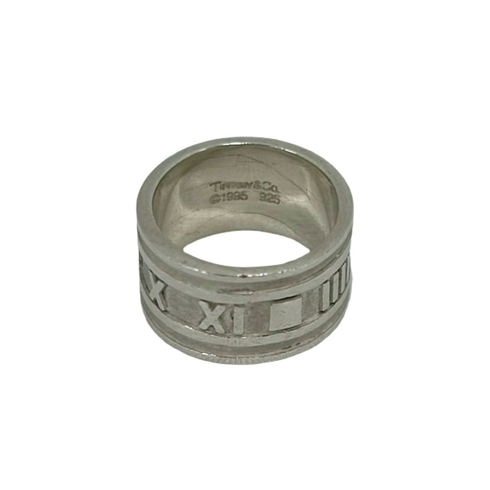 Silver Ring Band Tiffany: Silver Ring Band Tiffany Silver Ring Band Tiffany, US Size 6. A sterling silver band ring with a classic design from the iconic brand Tiffany. Made from high-quality silver material (925), this elegan