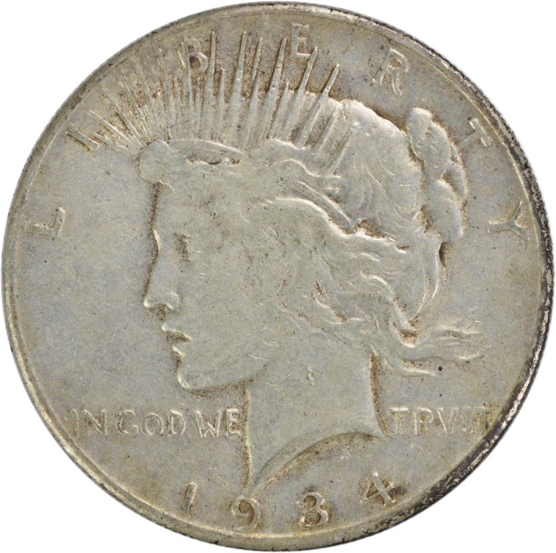 1934-S Peace Silver Dollar VF Uncertified: 1934-S Peace Silver Dollar VF Uncertified The 1934-S Peace Silver Dollar features a striking design, with the iconic Liberty profile on one side and an eagle on the other. Made from high-quality silve