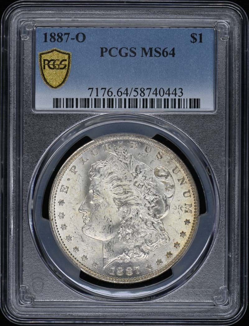 1887-O $1 Morgan Dollar PCGS MS64: 1887-O $1 Morgan Dollar PCGS MS64 MS64 graded 1887-O $1 Morgan Dollar from the New Orleans Mint, certified by PCGS. This uncirculated coin boasts a high level of detail and luster, showcasing its age 