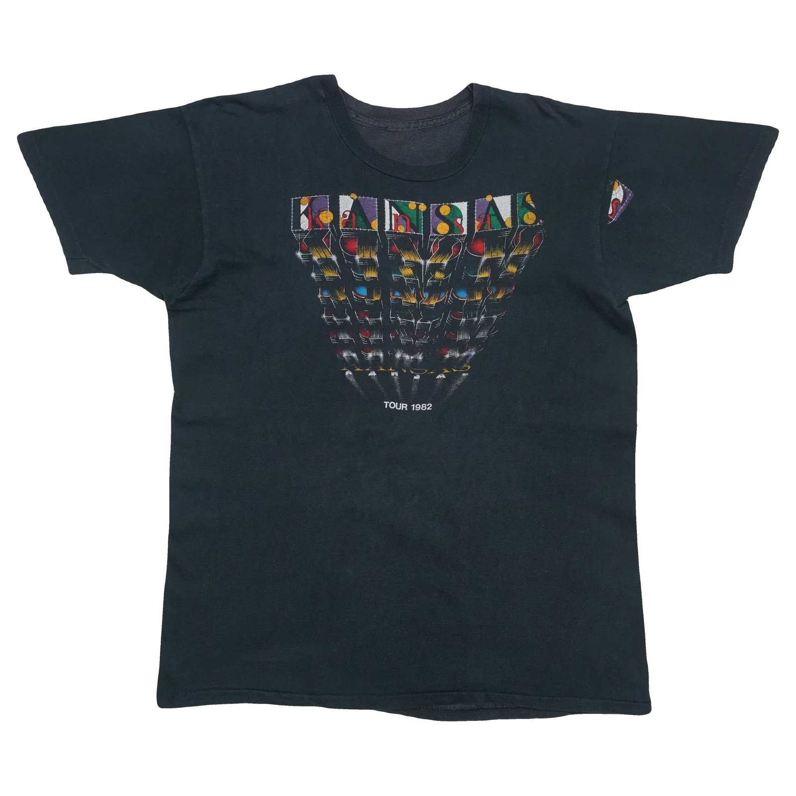 Kansas Tour Shirt 1982: Kansas Tour Shirt 1982 Authentic 1982 Kansas Tour Shirt, featuring the official tour logo and design from a memorable music event. This vintage tee has been carefully preserved to maintain its origina