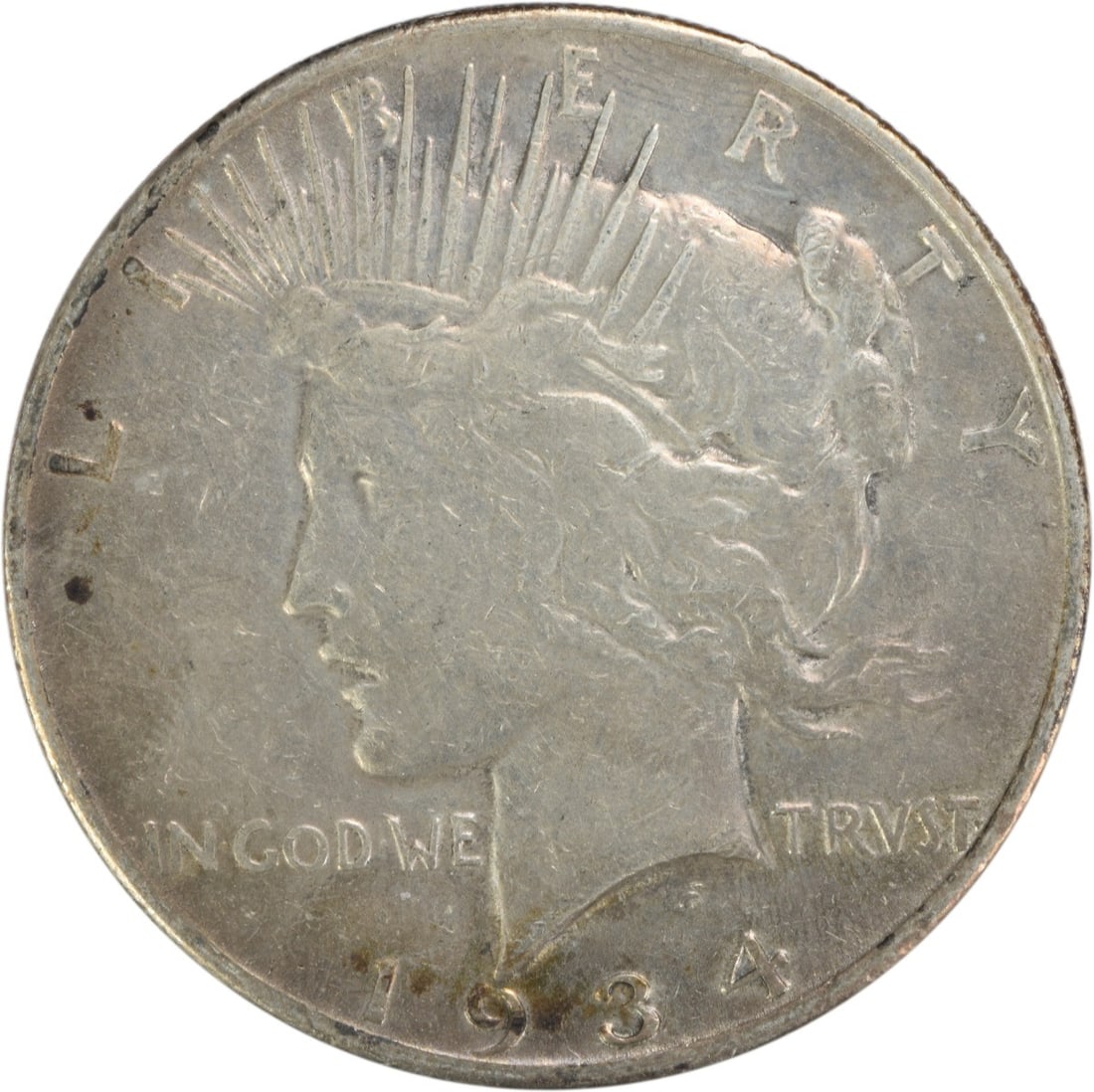 1934-S Peace Silver Dollar VF Uncertified: 1934-S Peace Silver Dollar VF Uncertified The 1934-S Peace Silver Dollar features a striking design, with the iconic Liberty profile on one side and an eagle on the other. Made from high-quality silve