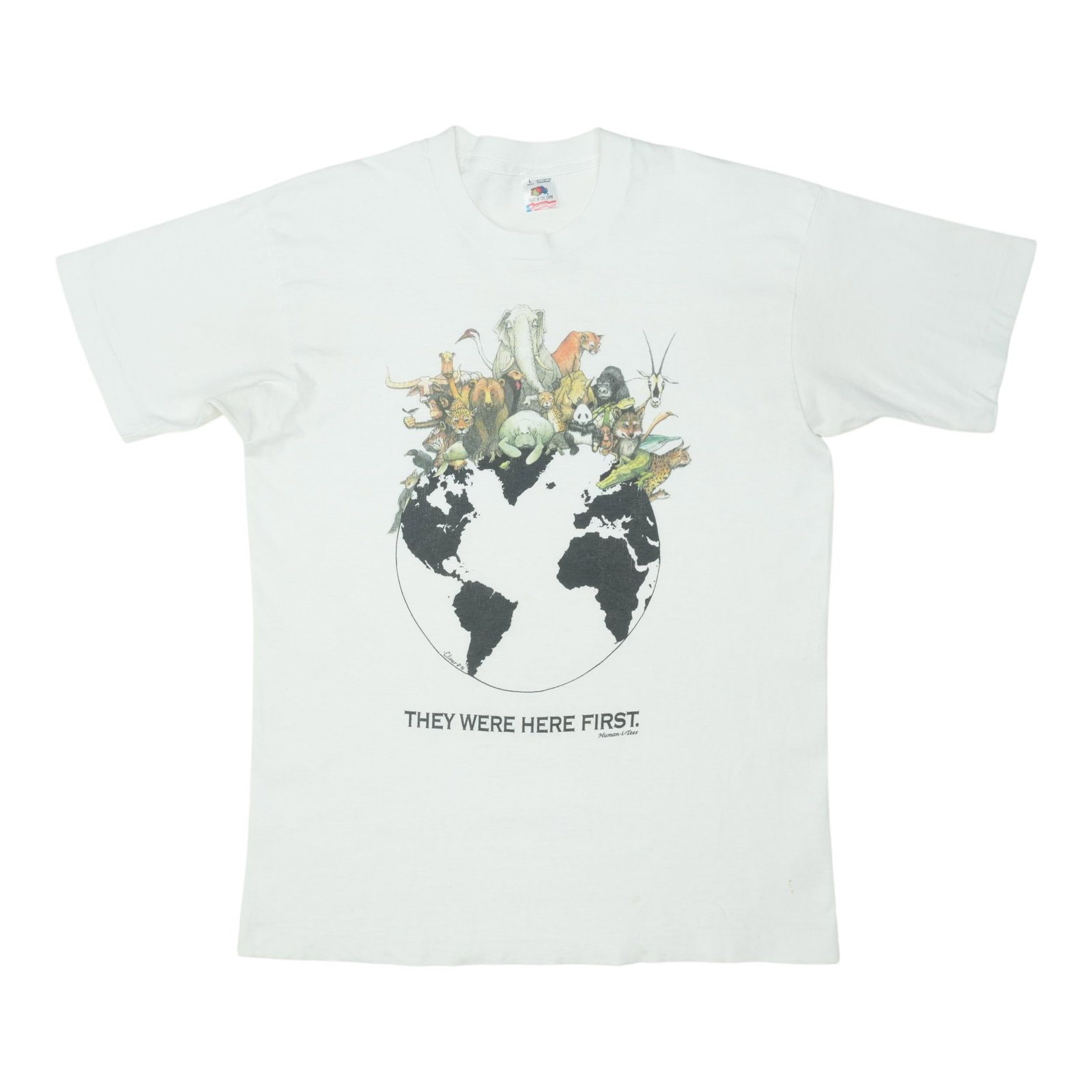 1992 They Were Here First Humanitees Shirt: 1992 They Were Here First Humanitees Shirt A unique piece from the 1990s, this 1992 They Were Here First Humanitees shirt showcases the brand's distinctive style. Featuring a bold design and vibrant c