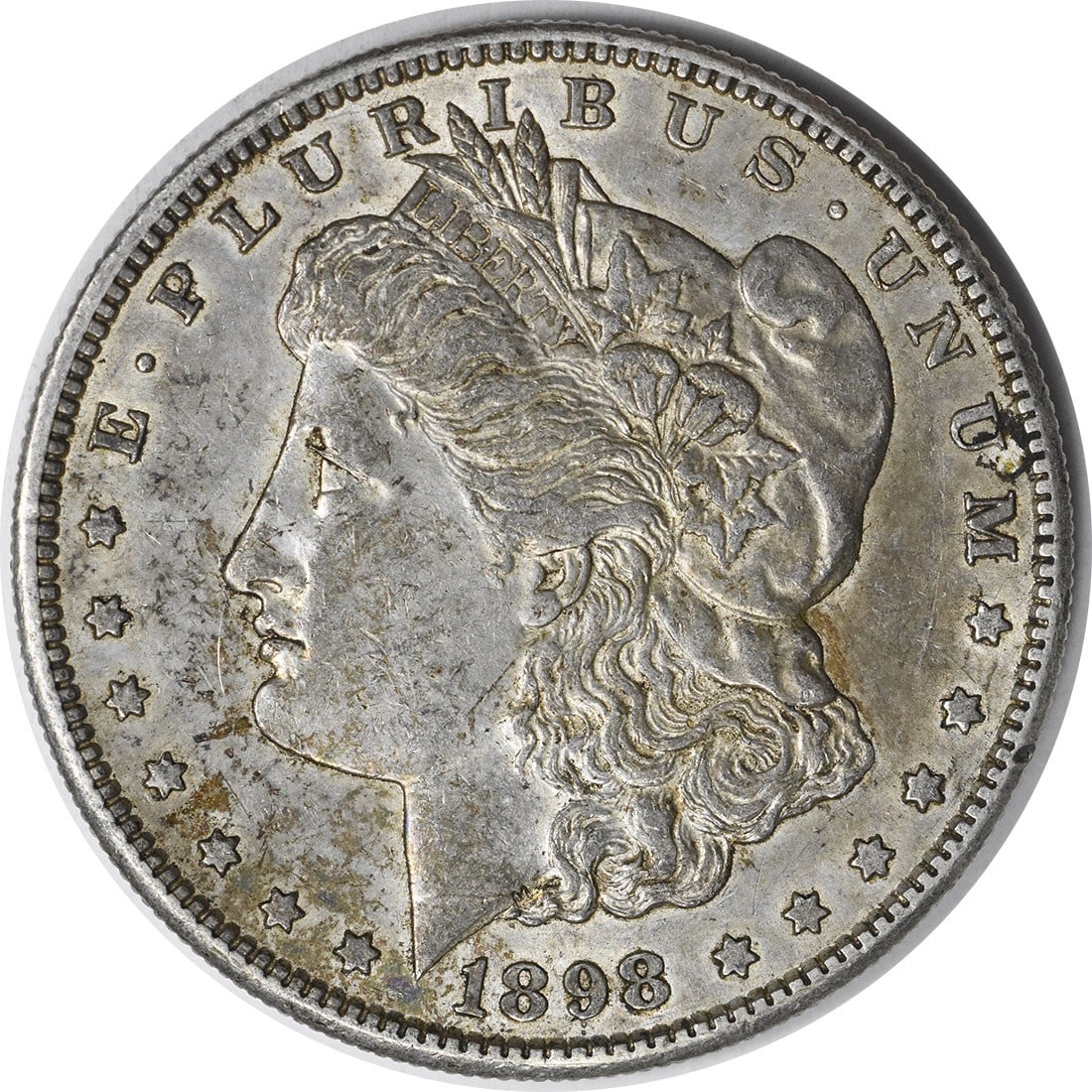 Morgan Silver Dollar AU Uncertified 1898-S: Morgan Silver Dollar AU Uncertified 1898-S The 1898-S Morgan Silver Dollar is an AU Uncertified circulated coin, showcasing its natural worn appearance. Made with 90% silver and 10% copper, it feature