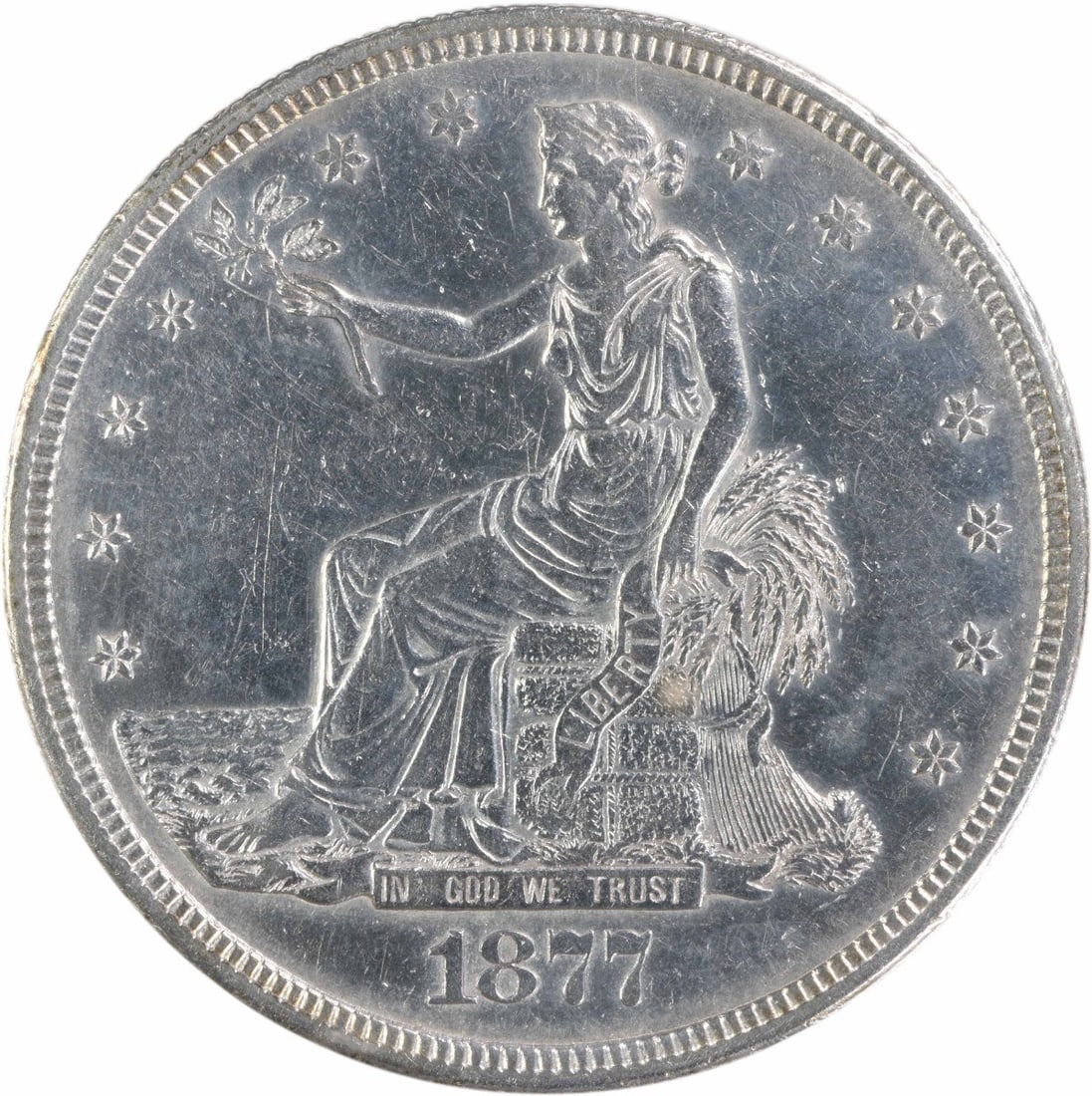 Trade Silver Dollar 1877 S AU Uncertified: Trade Silver Dollar 1877 S AU Uncertified The 1877 S AU Uncertified Trade Silver Dollar features an attractive silver finish and a circulated condition, showcasing its age and wear. With a grade of AU