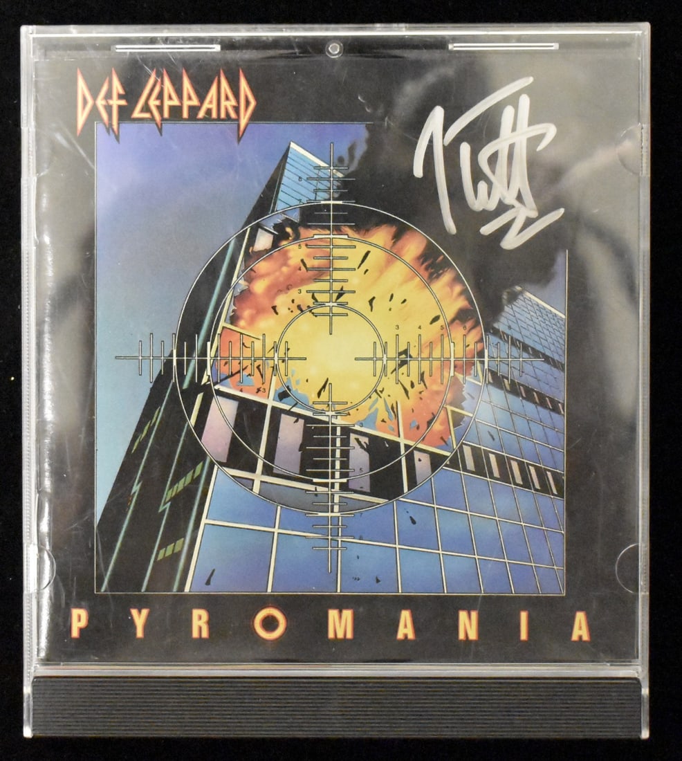 Signed Joe Elliott Def Leppard CD Cover Pyromania Autographed: Signed Joe Elliott Def Leppard CD Cover Pyromania Autographed Signed CD cover from Def Leppard's iconic album Pyromania, featuring the band's lead vocalist Joe Elliott. The item bears his signature an