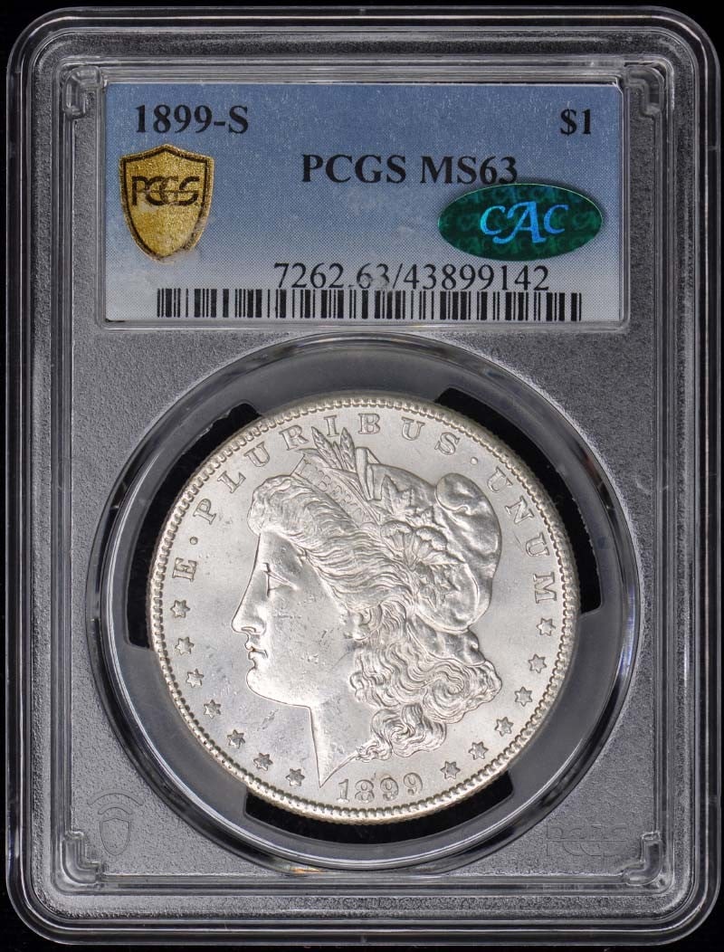 1899-S $1 Morgan Dollar PCGS MS63 (CAC): 1899-S $1 Morgan Dollar PCGS MS63 (CAC) The 1899-S $1 Morgan Dollar, graded MS63 by PCGS, boasts an impressive level of detail and wear, showcasing its uncirculated condition. Certified by the Coin