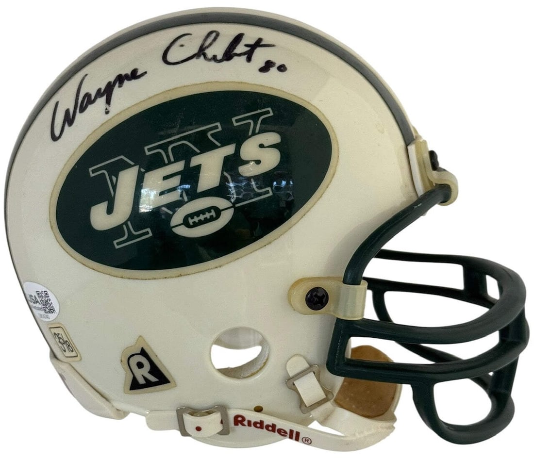 Wayne Chrebet Autographed New York Jets Mini Helmet (JSA): Wayne Chrebet Autographed New York Jets Mini Helmet (JSA) Signed in black sharpie across the side of the mini helmet by Wayne Chrebet, a legendary New York Jets wide receiver. This James Spence