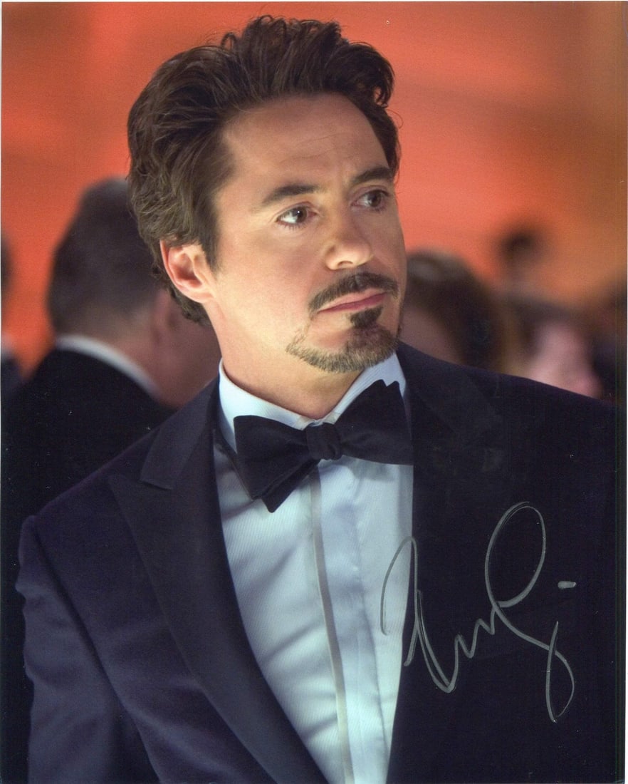 Robert Downey Jr. Autographed 8x10 Celebrity Photo: Robert Downey Jr. Autographed 8x10 Celebrity Photo Signed across the front in silver sharpie, Robert Downey Jr's 8x10 celebrity photo bears his personal mark. This unique piece captures a moment in