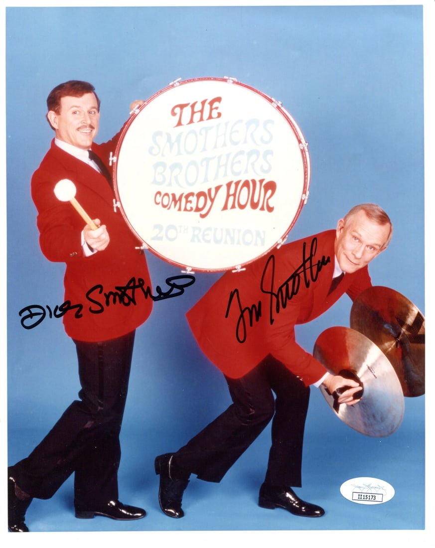 Smothers Dick Tommy Autographed 8x10 Comedy Photo JSA: Smothers Dick Tommy Autographed 8x10 Comedy Photo JSA Authentic 8x10 photo signed by the comedy duo Tommy and Dick Smothers in black sharpie. This rare collectible comes with a COA from James Spence A