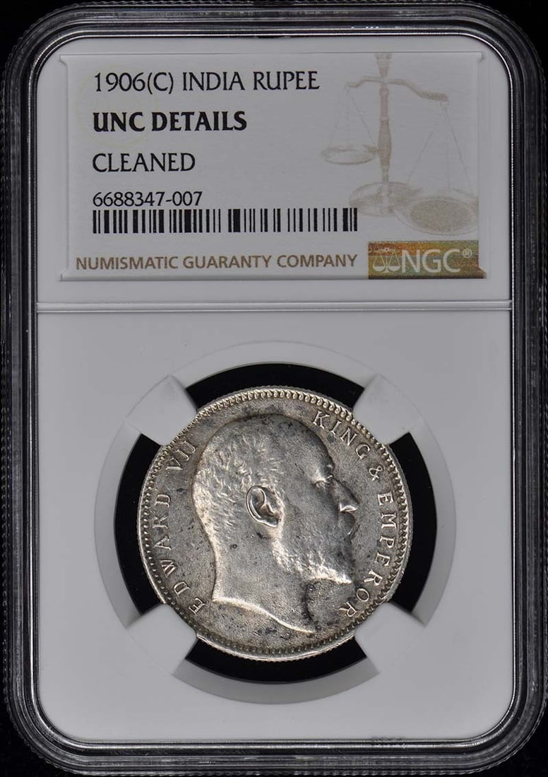 1906(C) INDIA RUPEE NGC UNC Details: 1906(C) INDIA RUPEE NGC UNC Details 1906(C) INDIA RUPEE NGC UNC Details - A rare and highly detailed example of the India Rupee from 1906, certified by the Numismatic Guaranty Corporation (NGC). This 