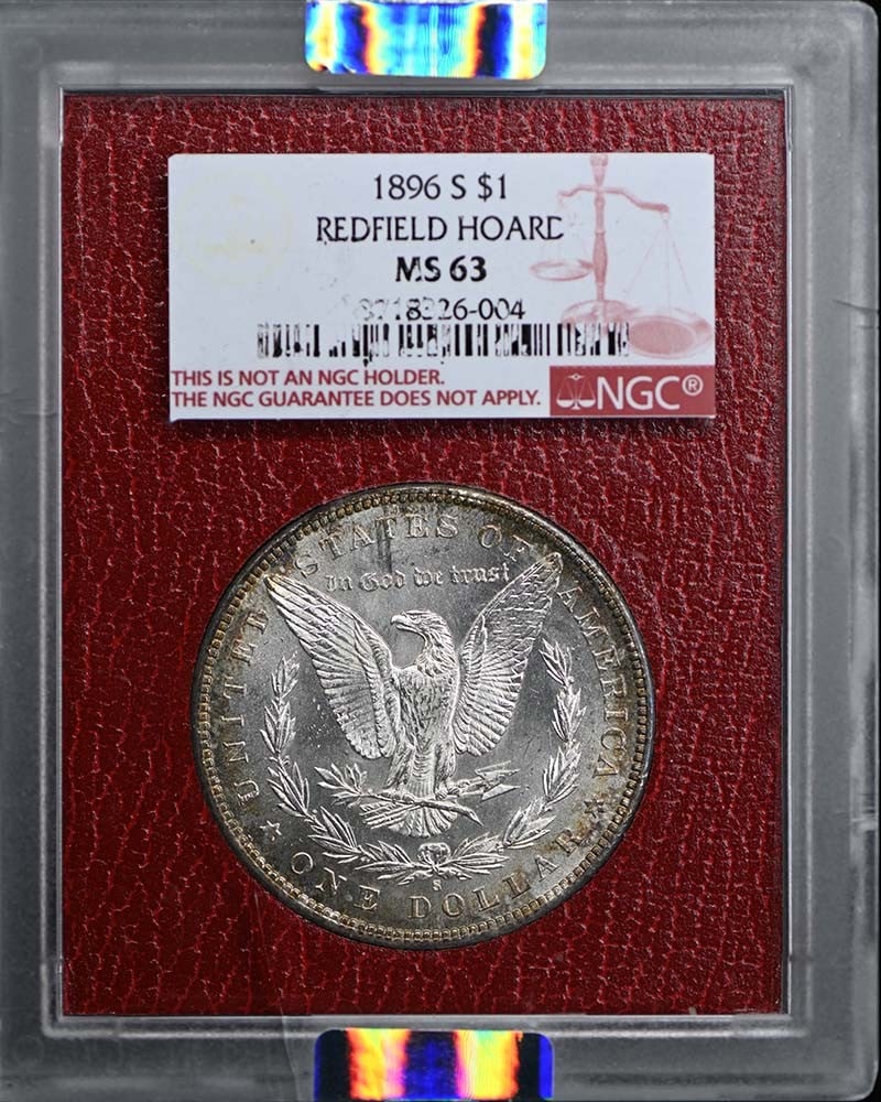 REDFIELD HOARD MORGAN DOLLAR 1896 $1 NGC MS63: REDFIELD HOARD MORGAN DOLLAR 1896 $1 NGC MS63 The Redfield Hoard Morgan Dollar, graded MS63 by the NGC, is an uncirculated example from 1896. This coin bears the signature of its creator, George T. Mo