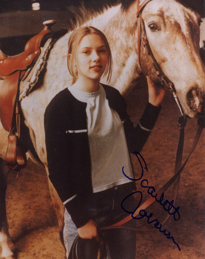 Scarlett Johansson Autographed 8x10 Photo: Scarlett Johansson Autographed 8x10 Photo Scarlett Johansson's image is captured in an 8x10 photo, bearing her signature in blue sharpie across the front. The item comes with authentication from Rich 