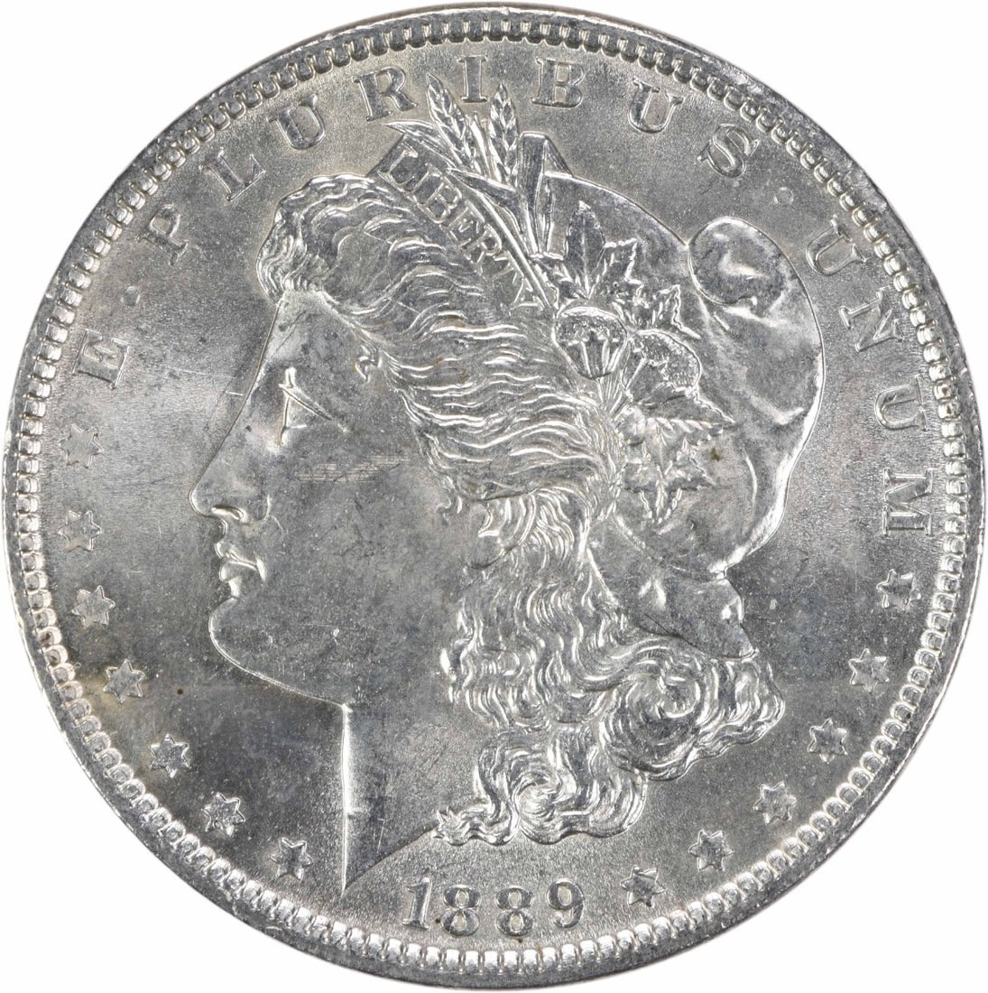 Morgan Silver Dollar Choice Uncertified 1889 Dollar: Morgan Silver Dollar Choice Uncertified 1889 Dollar Choice Uncertified 1889 Morgan Silver Dollar, graded Choice BU, features the iconic design of Augustus Saint-Gaudens on its obverse and a classic re
