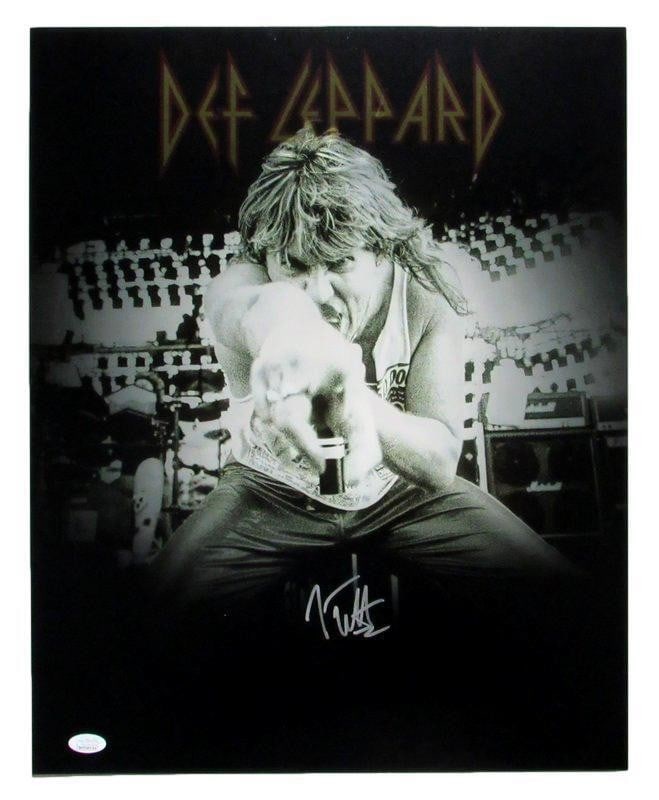 Elliott Joe Autographed Photo Def Leppard 16x20 JSA 170222: Elliott Joe Autographed Photo Def Leppard 16x20 JSA 170222 Elliott Joe's autograph adds a unique touch to this rare Def Leppard photo, measuring 16x20 inches and certified by the JSA authentication se