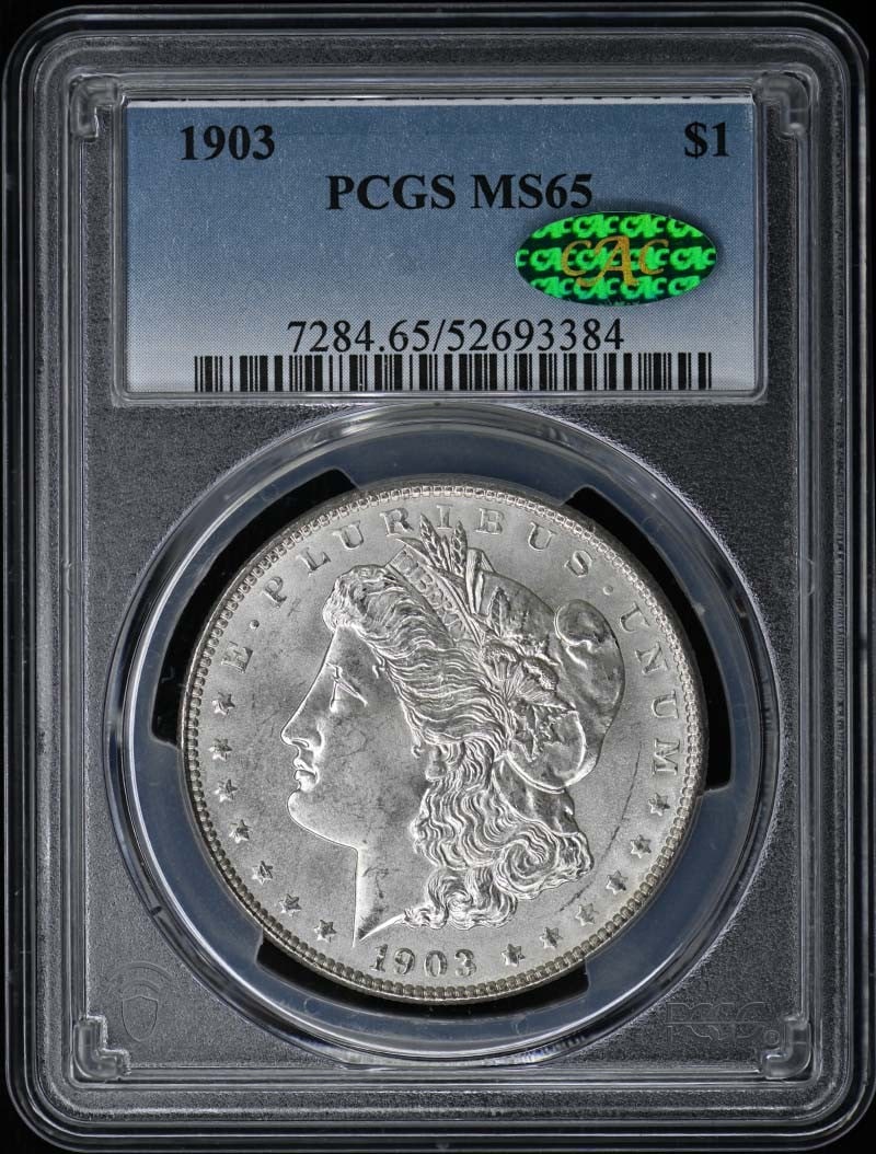 1903 $1 Morgan Dollar PCGS MS65 (CAC): 1903 $1 Morgan Dollar PCGS MS65 (CAC) The 1903 $1 Morgan Dollar, graded MS65 by PCGS, boasts exceptional condition with its uncirculated mint mark. Certified by the Coin Authentication Corporation (CA
