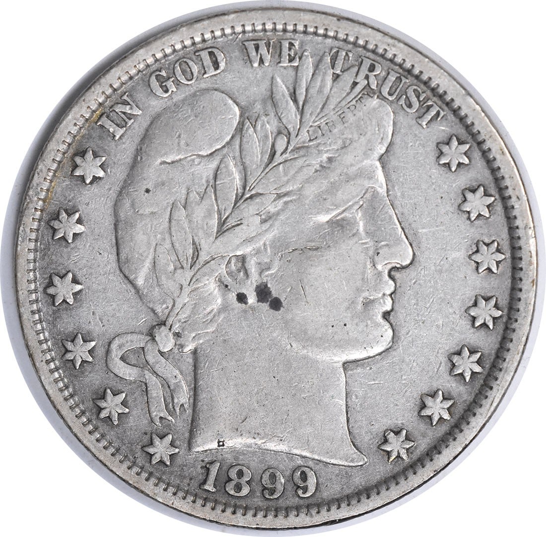 Barber Silver Half Dollar VF Uncertified 1899: Barber Silver Half Dollar VF Uncertified 1899 The Barber Silver Half Dollar, minted in 1899, boasts its original silver composition and features the iconic Barber design. This circulated coin bears a 