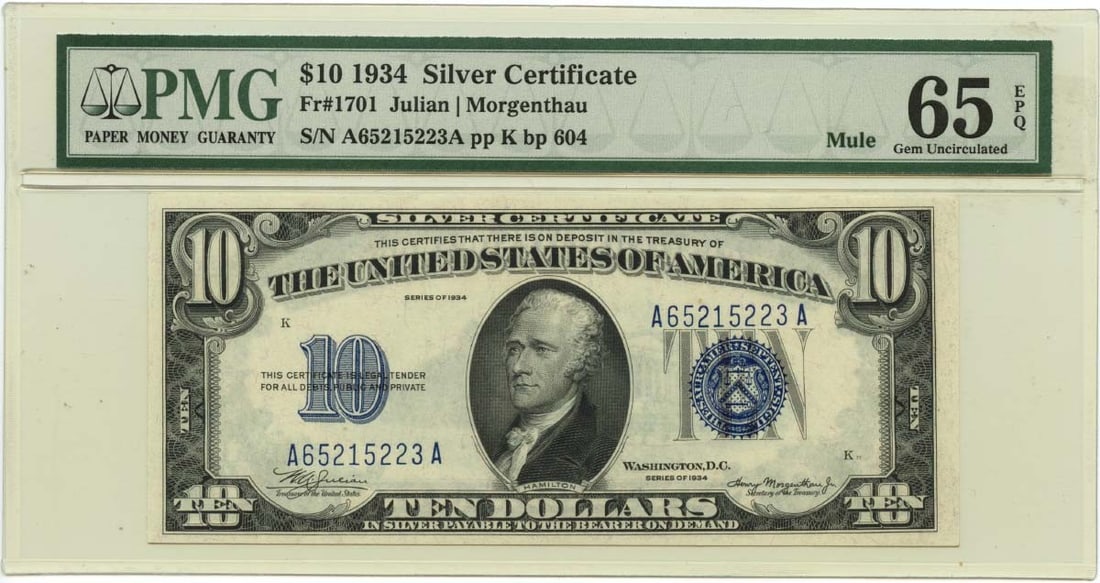 1934 $10 Silver Certificate Blue MULE Fr# 1701 PMG GEM 65 EPQ: 1934 $10 Silver Certificate Blue MULE Fr# 1701 PMG GEM 65 EPQ The 1934 $10 Silver Certificate Blue Mule, Fr# 1701, boasts an impressive PMG GEM 65 EPQ grade, showcasing exceptional condition and rarit