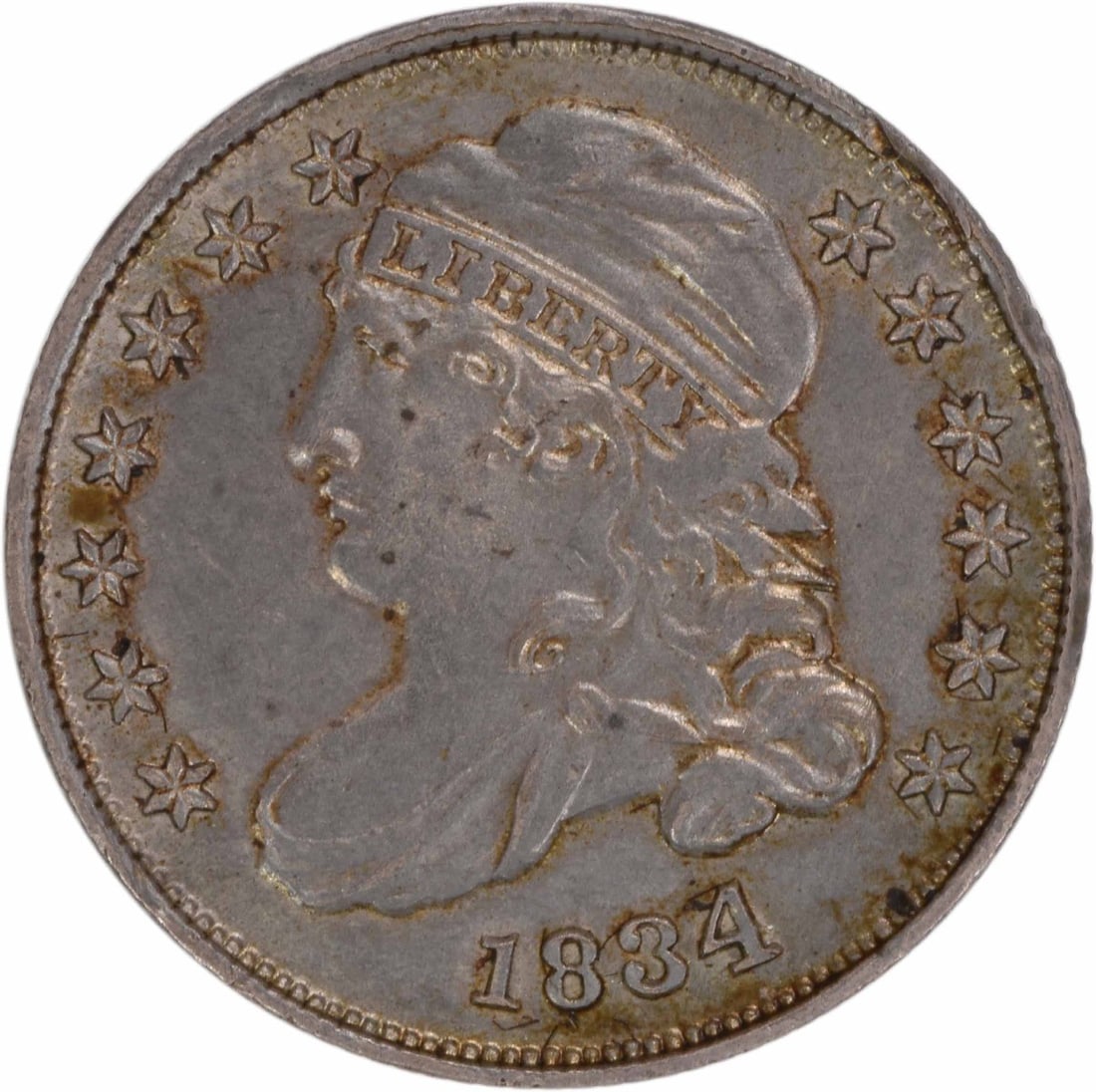 1834 Bust Silver Dime AU Slider Uncertified: 1834 Bust Silver Dime AU Slider Uncertified The 1834 Bust Silver Dime AU Slider Uncertified features a classic Capped Bust design by John Reich, showcasing the iconic profile of Lady Liberty. Made fro