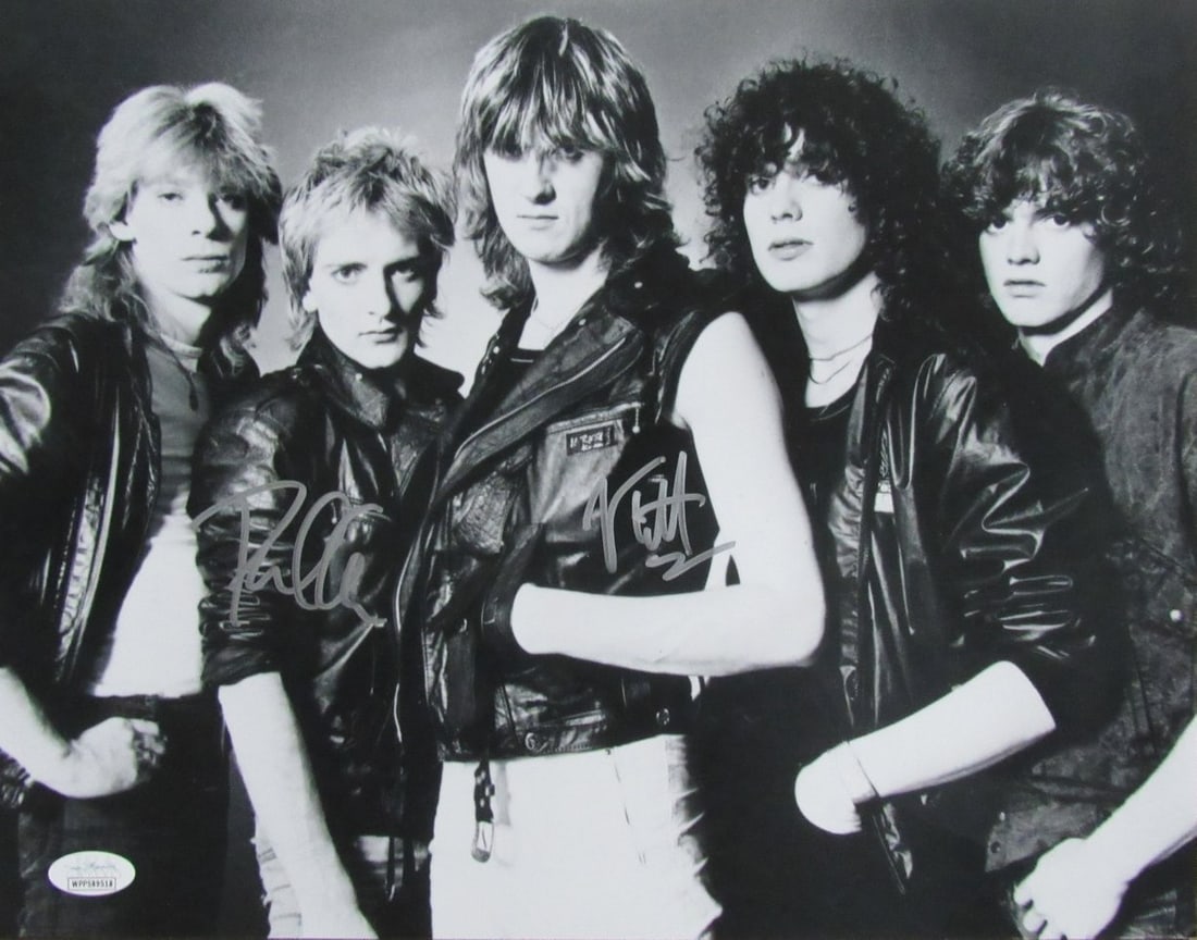Joe Elliott Phil Collen signed dual photo Def Leppard auto JSA: Joe Elliott Phil Collen signed dual photo Def Leppard auto JSA Dual photo signed by Joe Elliott and Phil Collen, members of the iconic rock band Def Leppard. The item bears signatures from two notable
