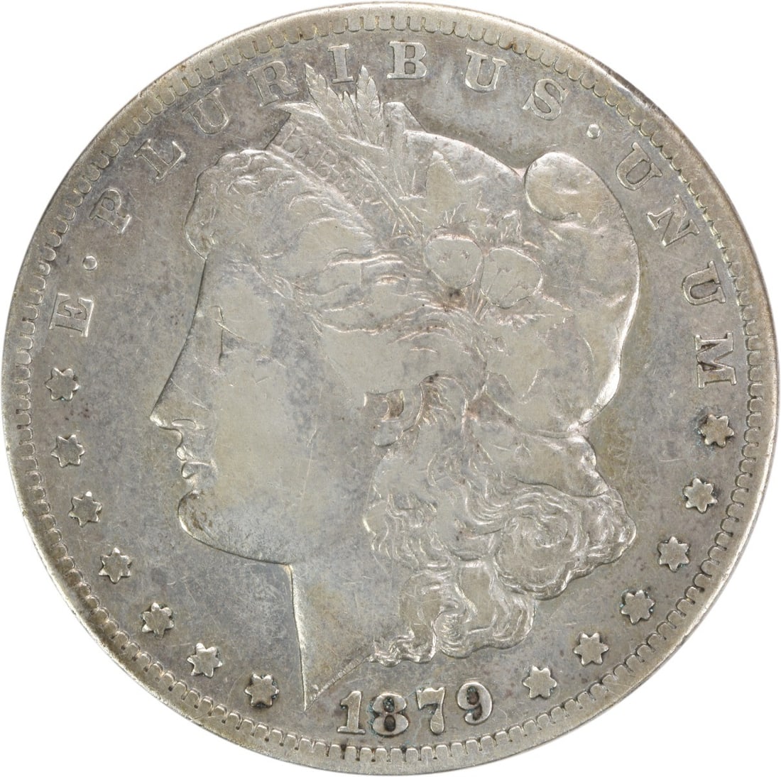 Morgan Silver Dollar CC 1879 Uncertified: Morgan Silver Dollar CC 1879 Uncertified The Morgan Silver Dollar CC 1879 Uncertified is a genuine circulated coin from the Carson City mint, weighing 26.73 grams and featuring a reeded edge. Made of 